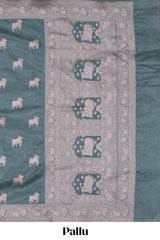Jade green cow zari motifs design banarasi silk saree with self border and matching blouse
