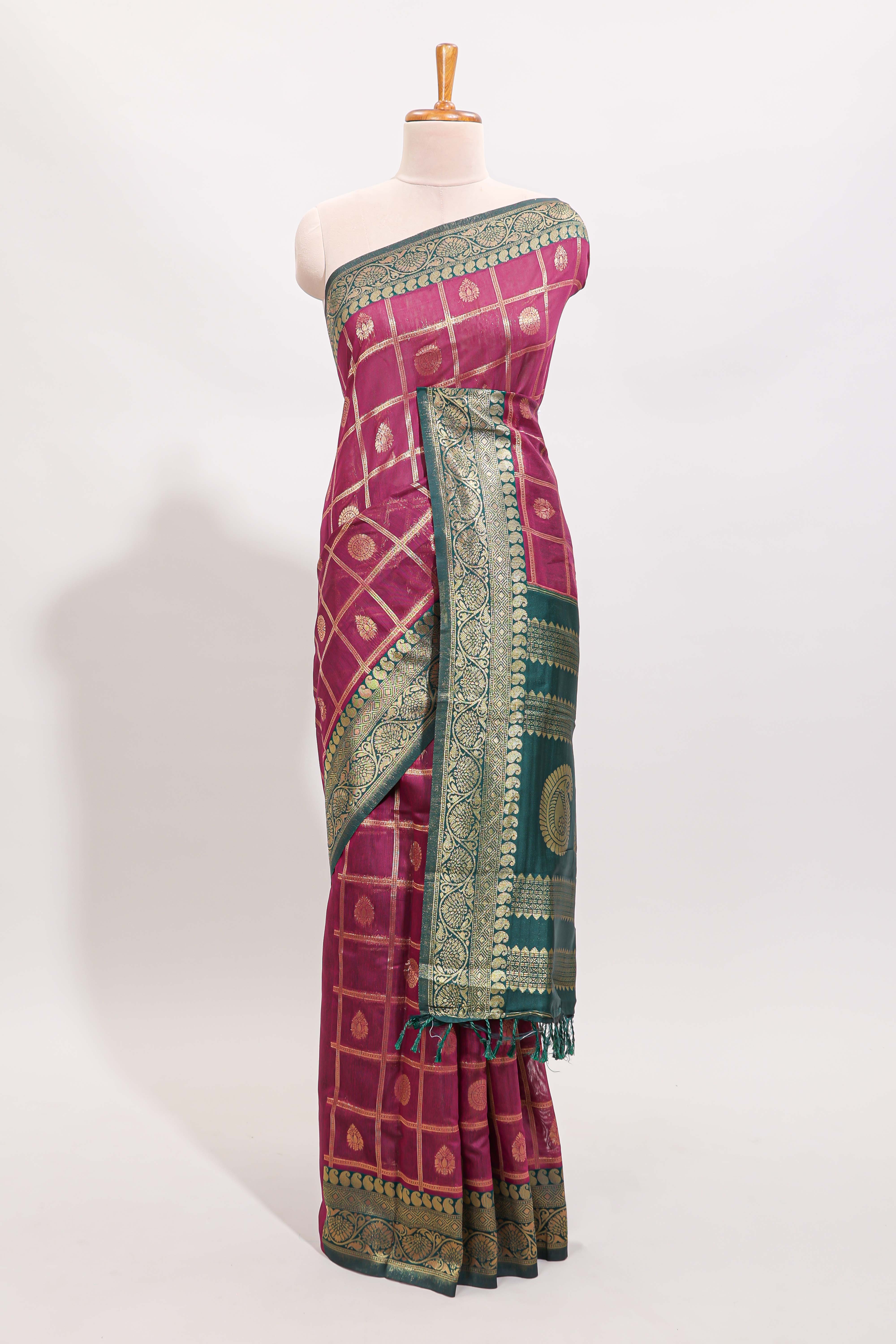 Magenta all-over checked grid pattern and butta banarasi silk saree with green contrast floral zari border and buttas blouse