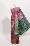 Magenta all-over checked grid pattern and butta banarasi silk saree with green contrast floral zari border and buttas blouse
