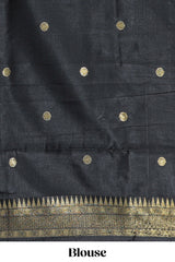 Red shade checked and butta banarasi silk saree with black contrast geometric zari border and buttas blouse