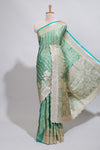 Sea green striped floral design banarasi silk saree with self zari border and blouse