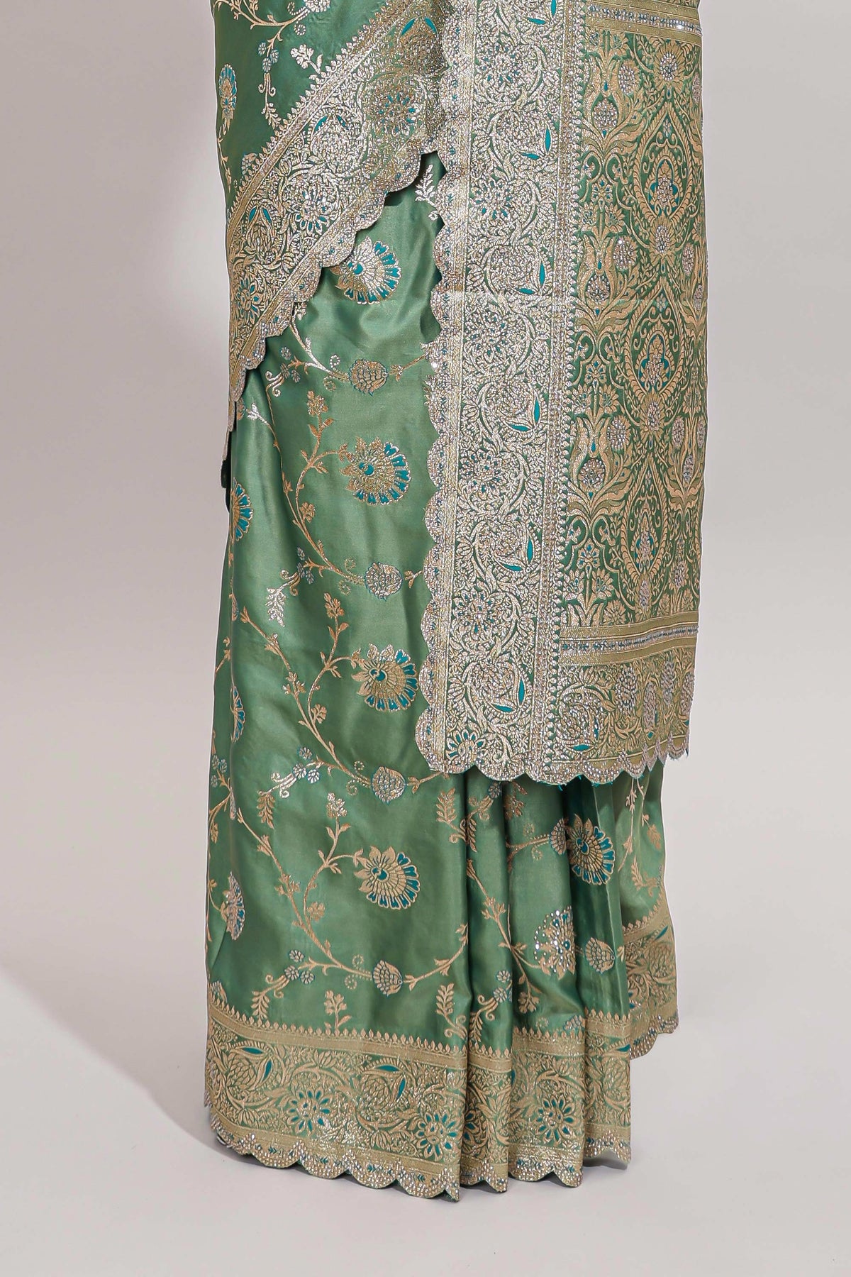 Sea green floral designed banarasi silk saree with self zari border and blouse
