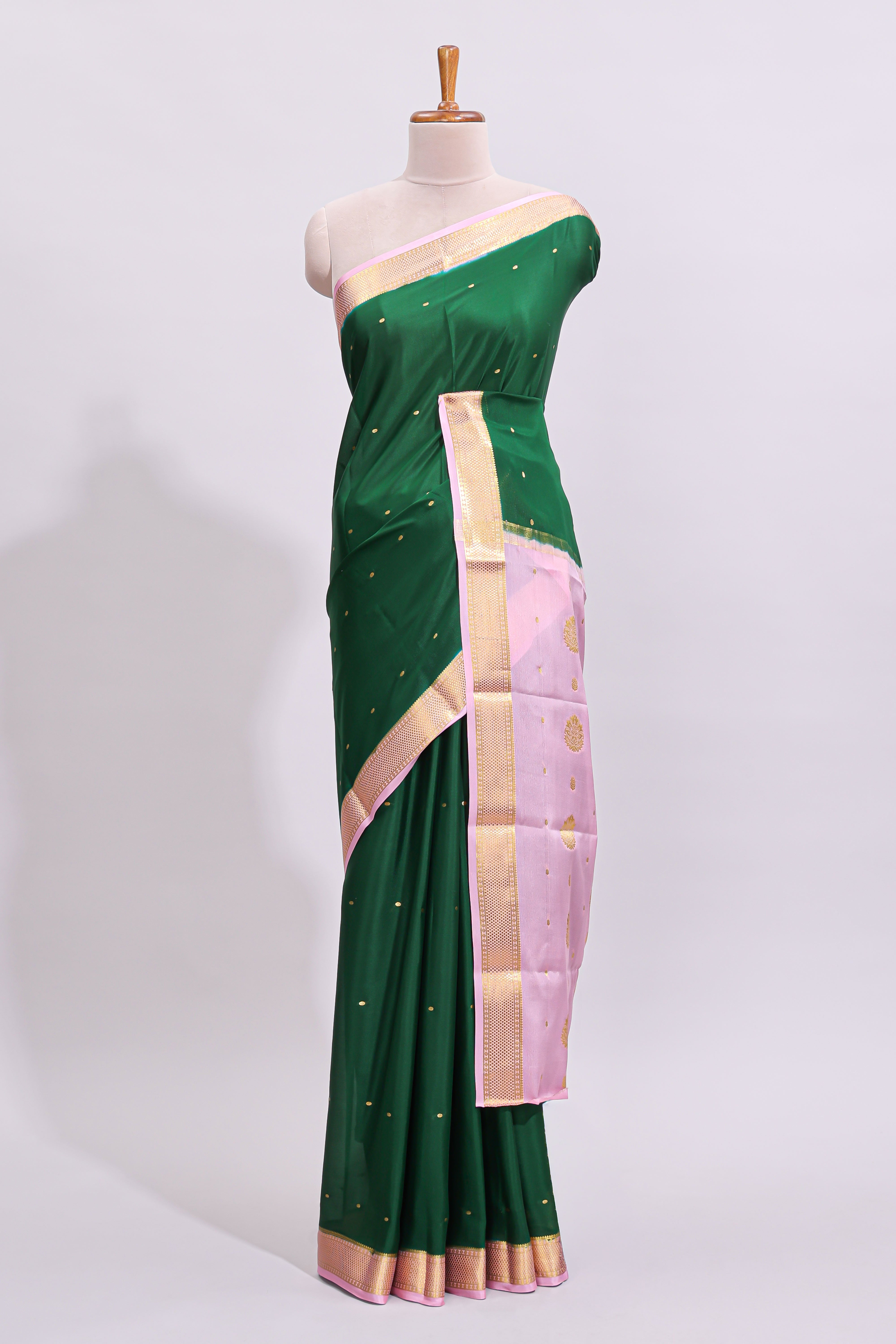 Green zari motifs design pure mysore silk saree with contrast border and zari motifs blouse
