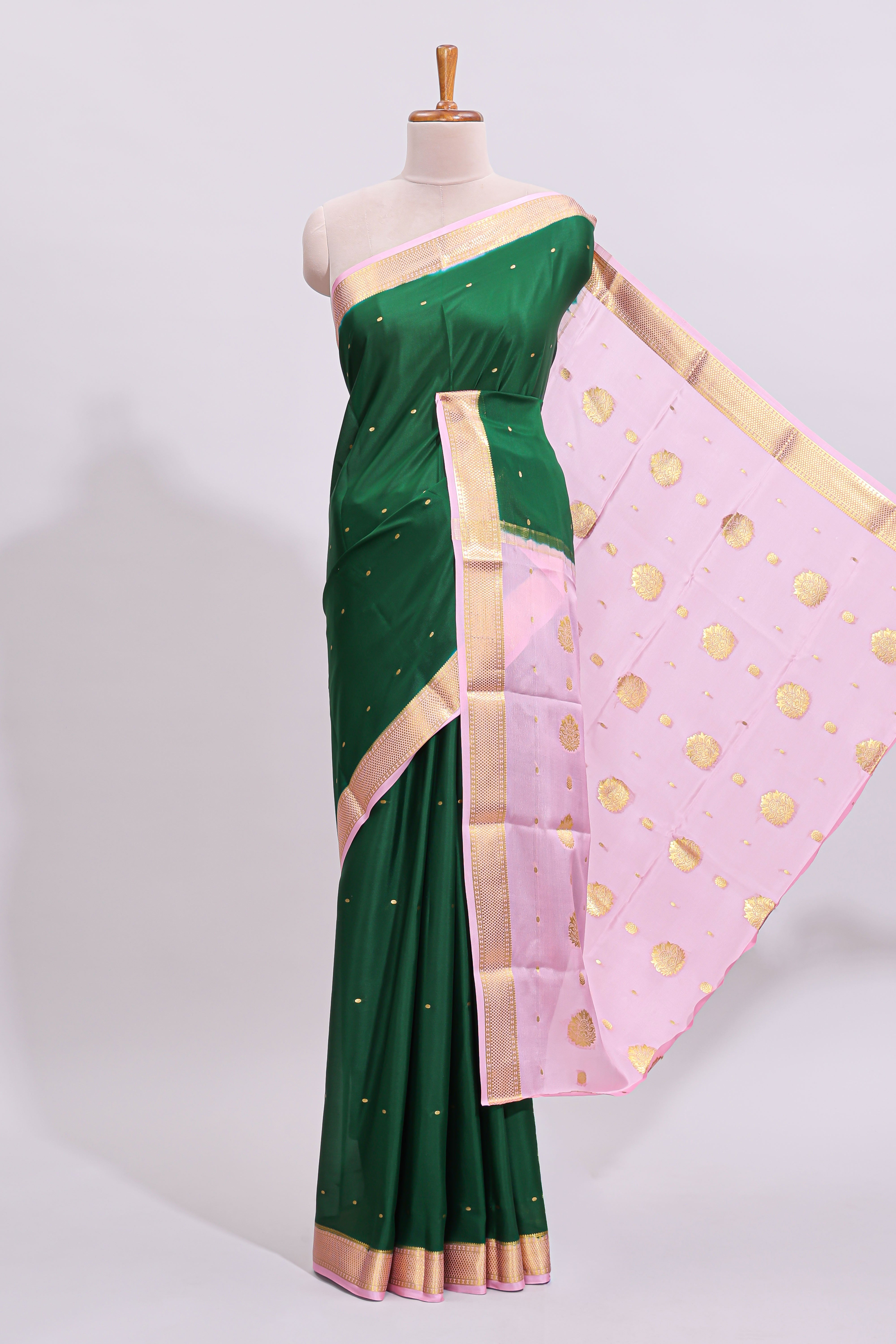 Green zari motifs design pure mysore silk saree with contrast border and zari motifs blouse