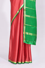 Coral pink plain design pure mysore silk saree with contrast border and blouse
