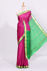 Purple plain design pure mysore silk saree with contrast border and blouse