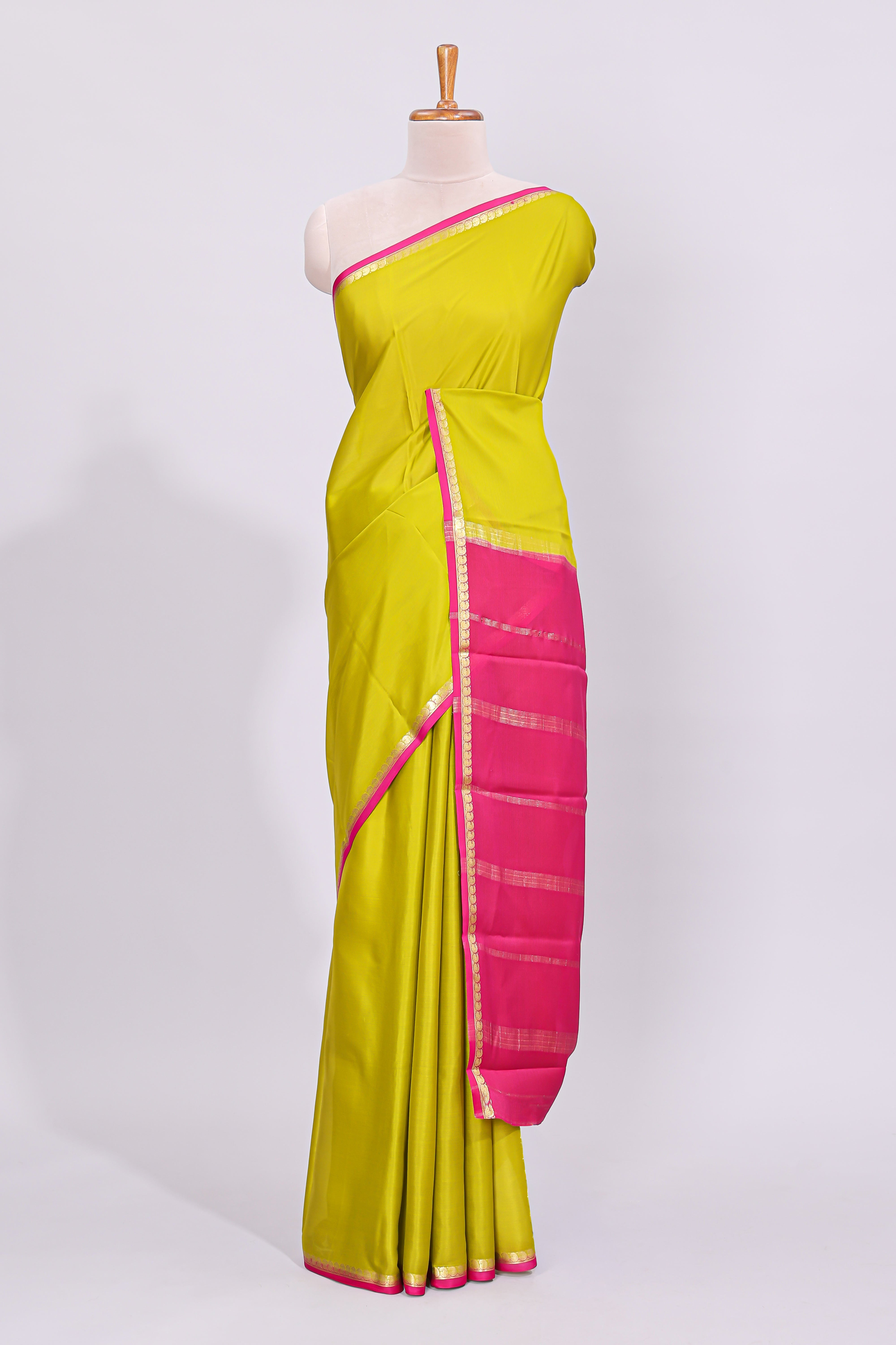 Lime yellow plain design pure mysore silk saree with contrast border and blouse