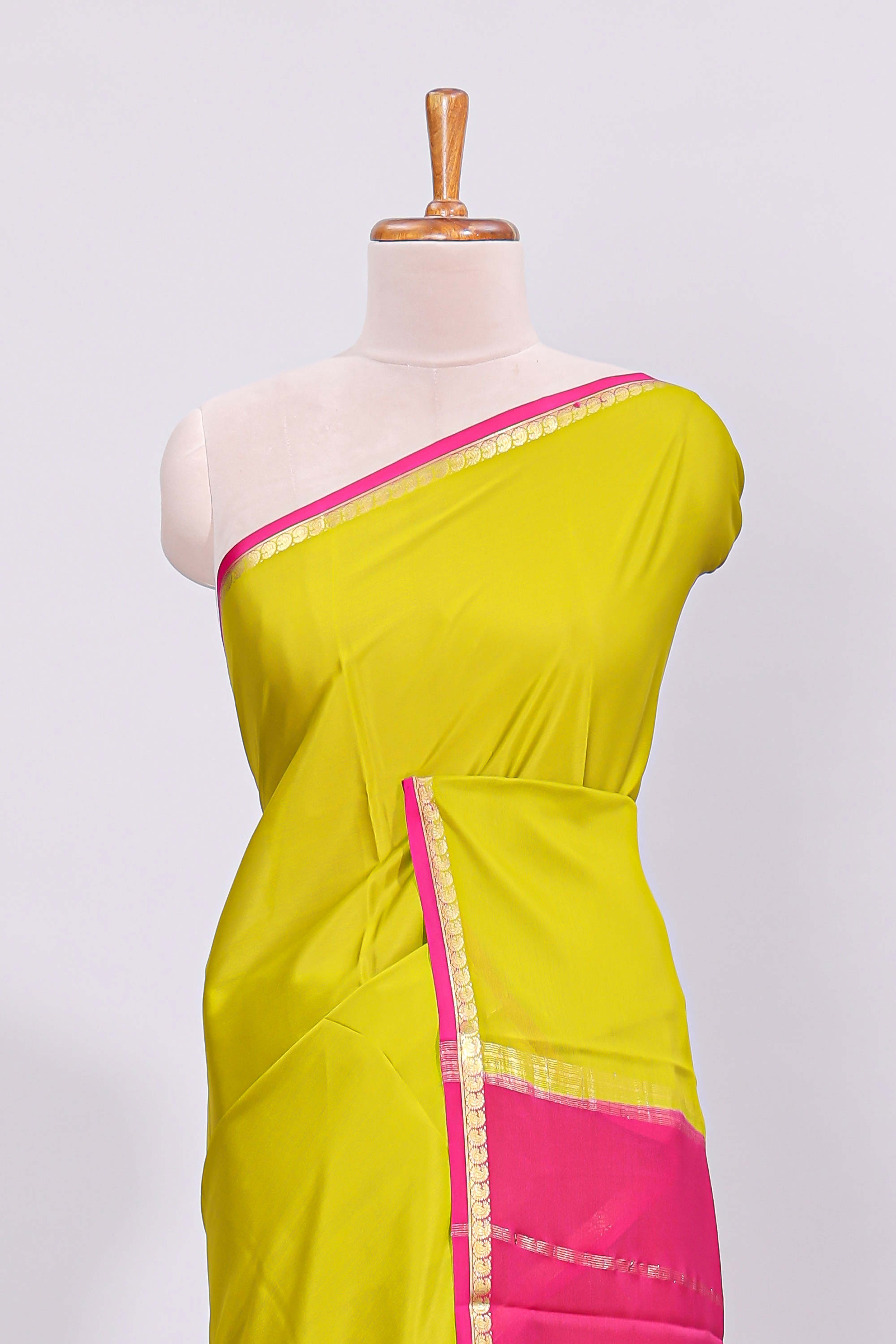 Lime yellow plain design pure mysore silk saree with contrast border and blouse