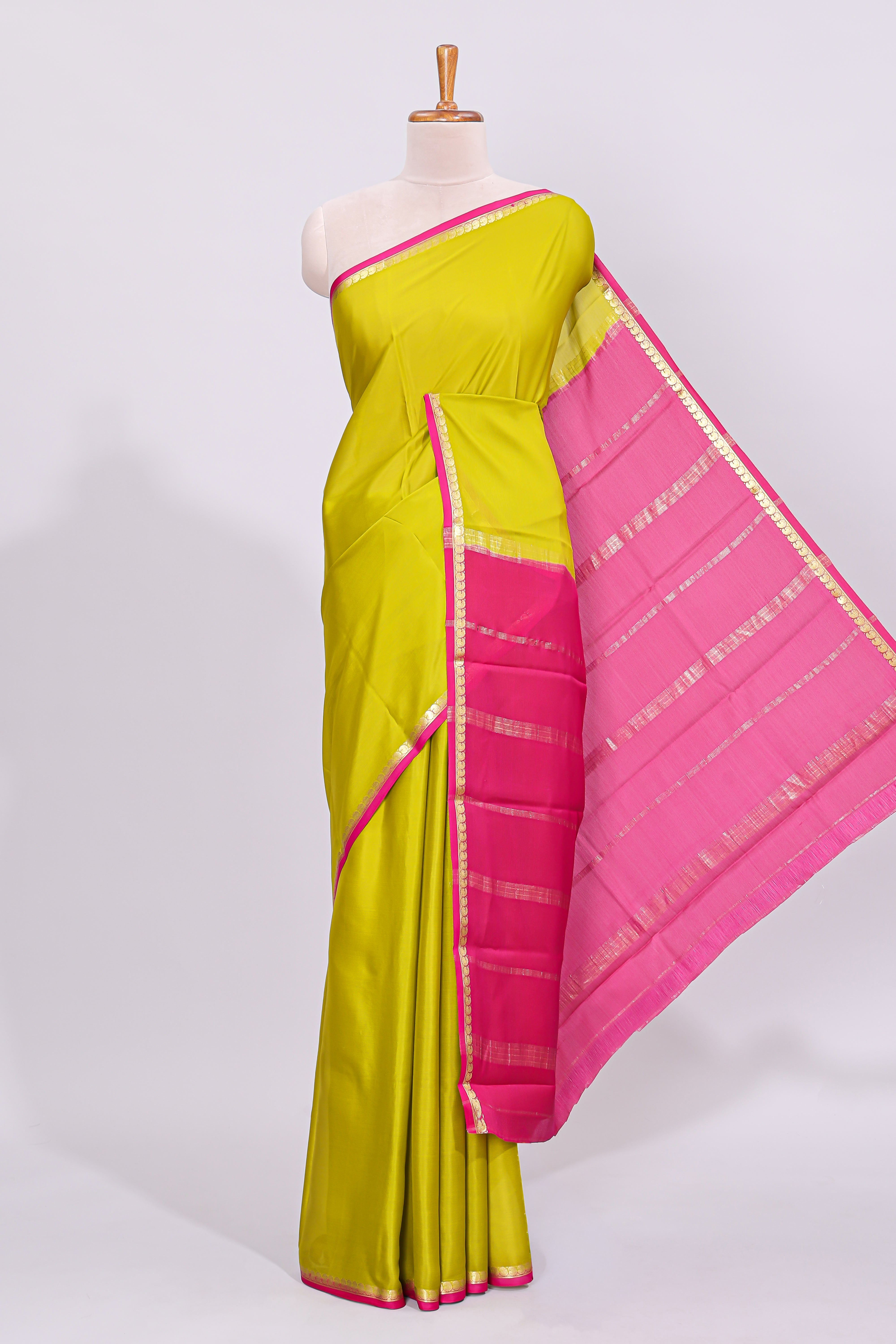 Lime yellow plain design pure mysore silk saree with contrast border and blouse