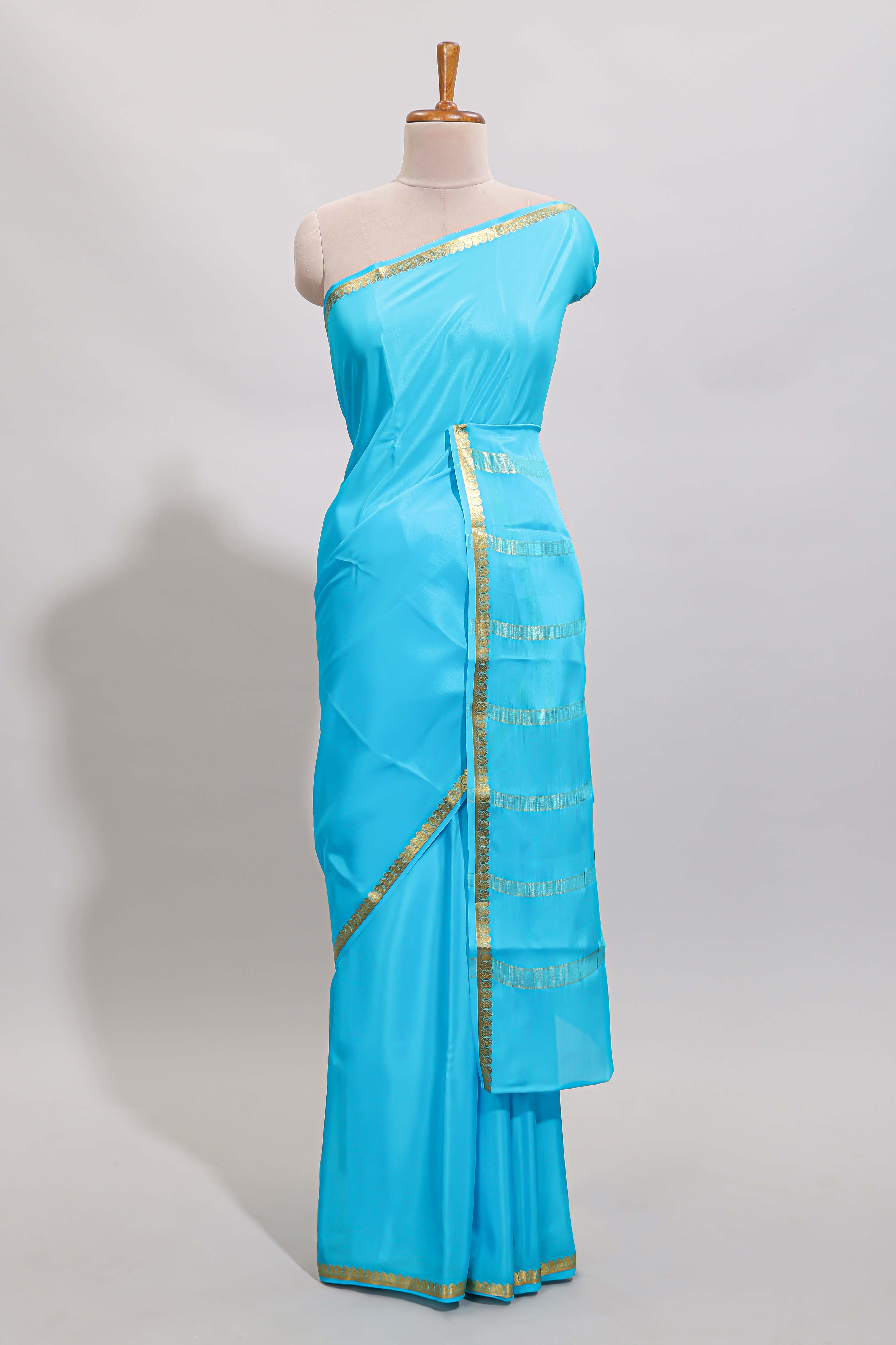 Sky blue plain design pure mysore silk saree with contrast border and matching blouse