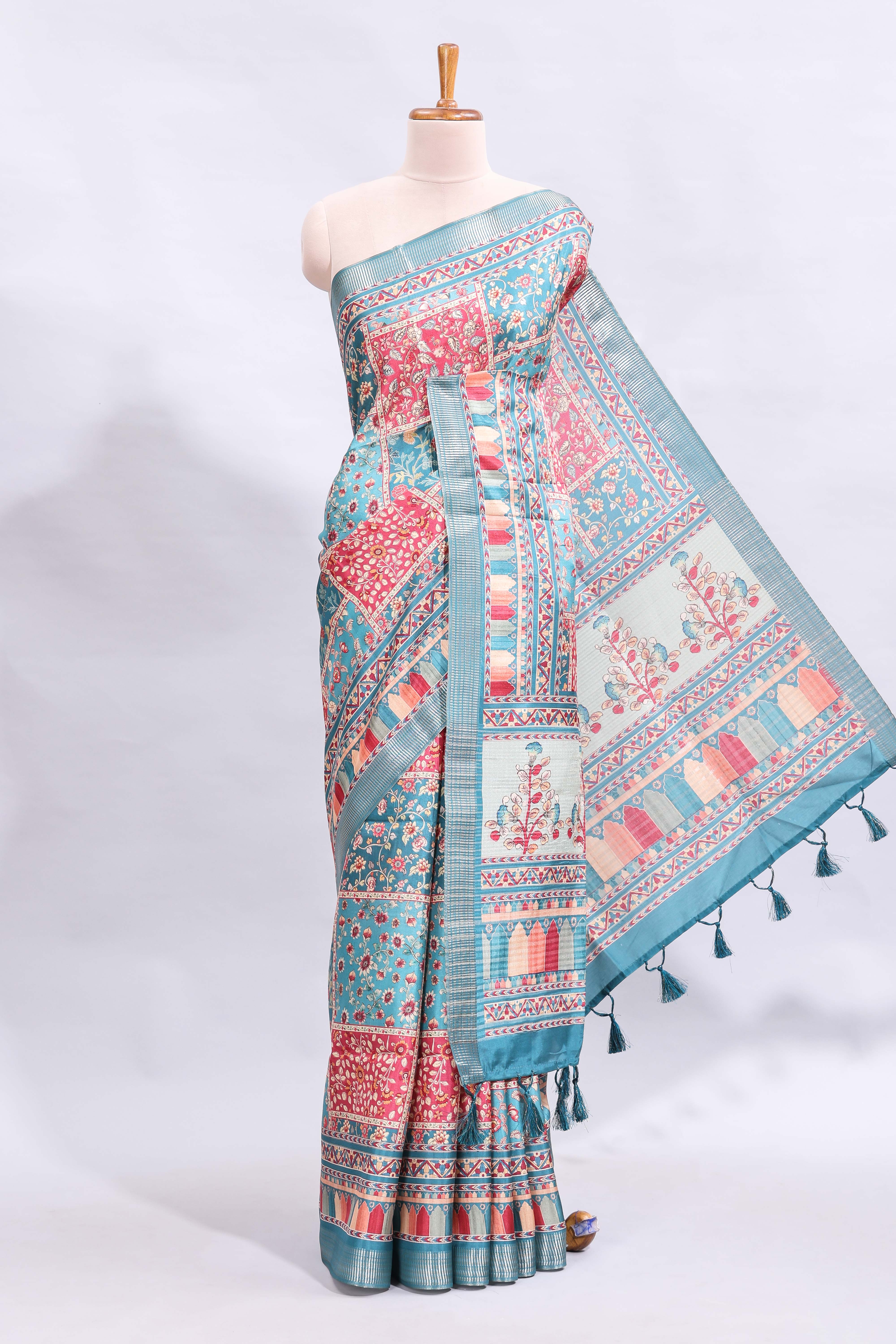 Blue floral design printed saree and self geometric design border and striped blouse