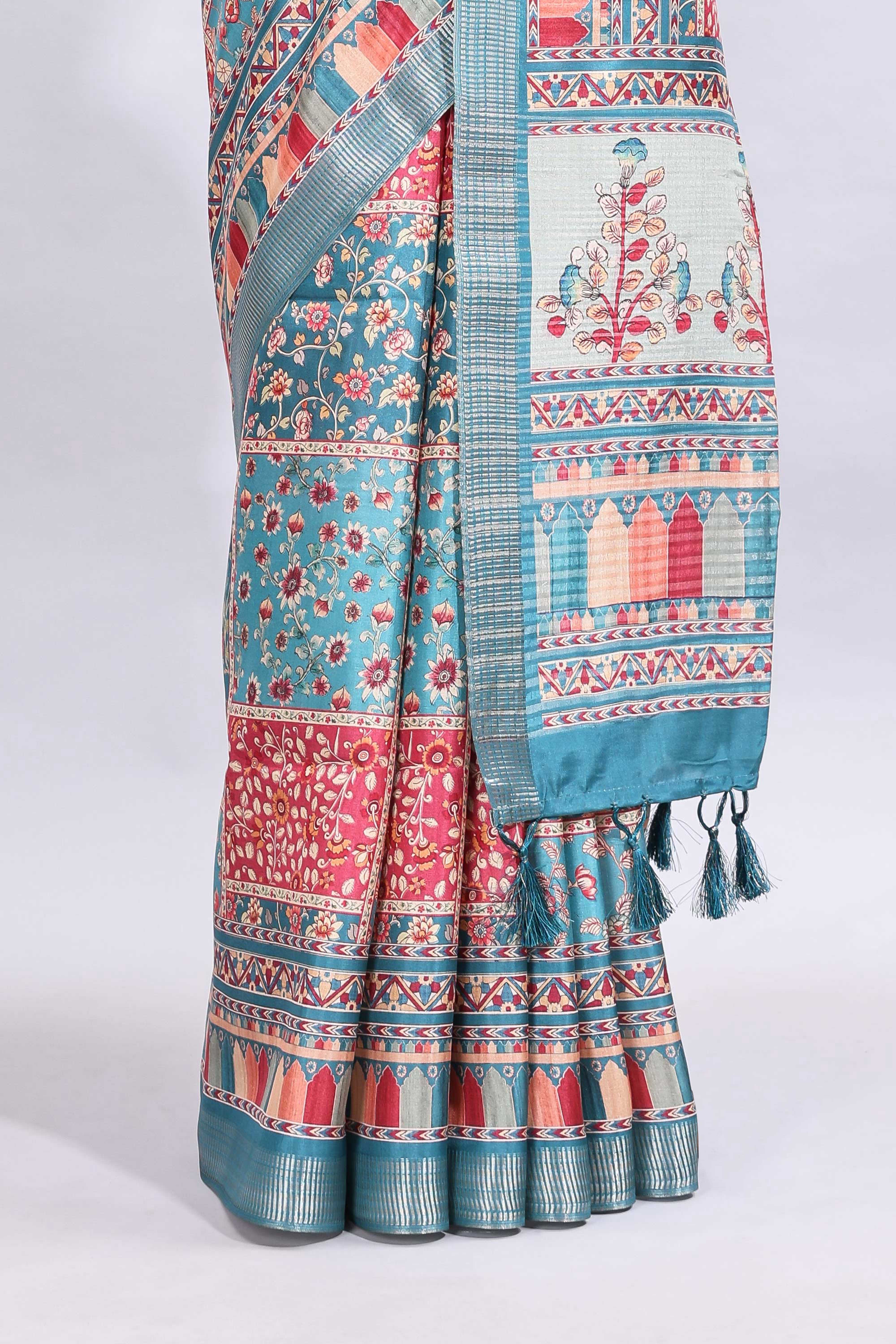 Blue floral design printed saree and self geometric design border and striped blouse