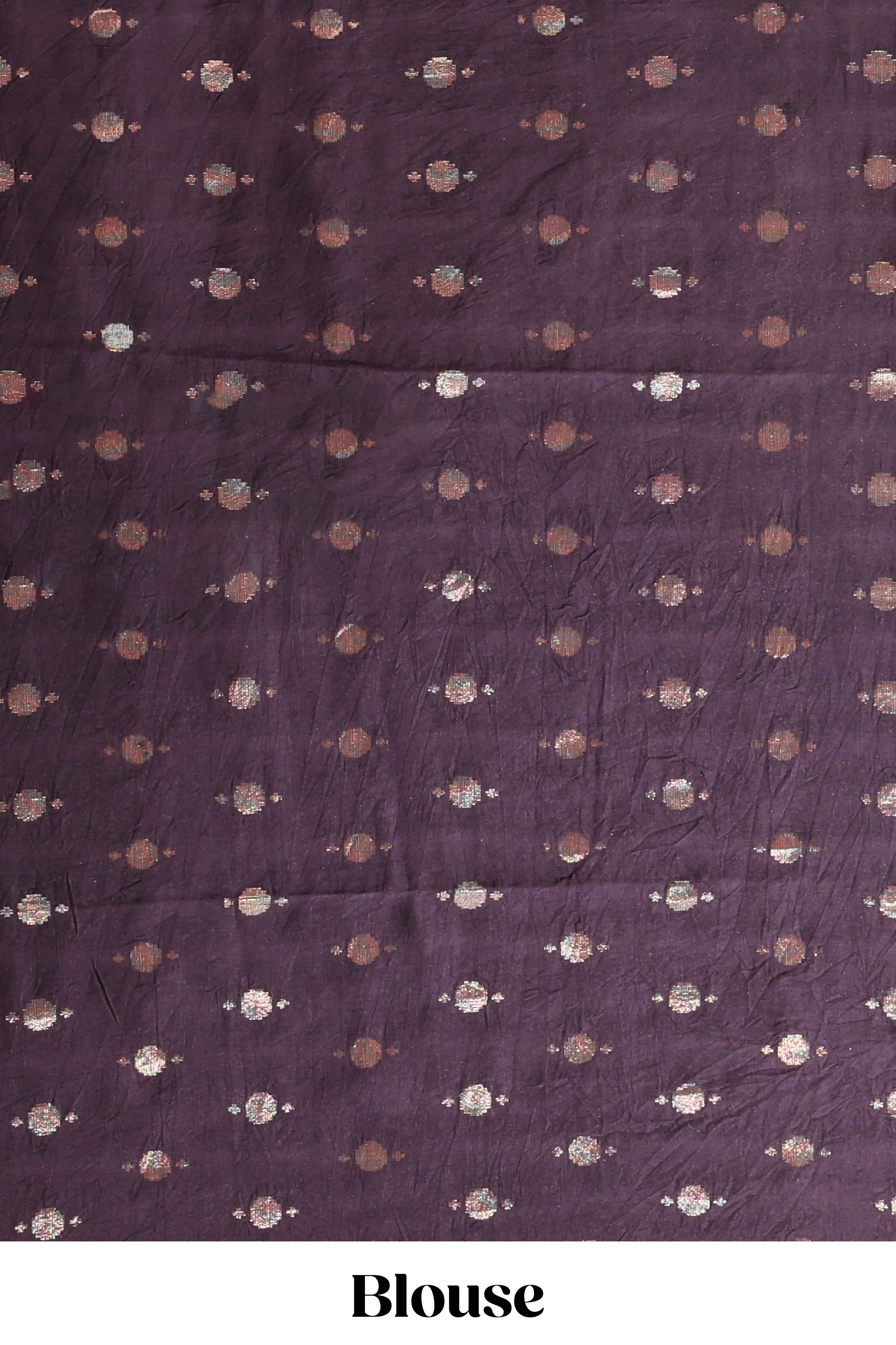 Maroon printed saree with traditional art motifs with contrast zari border and motifs blouse