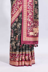 Black traditional theme printed saree with contrast floral & cow design border and plain blouse