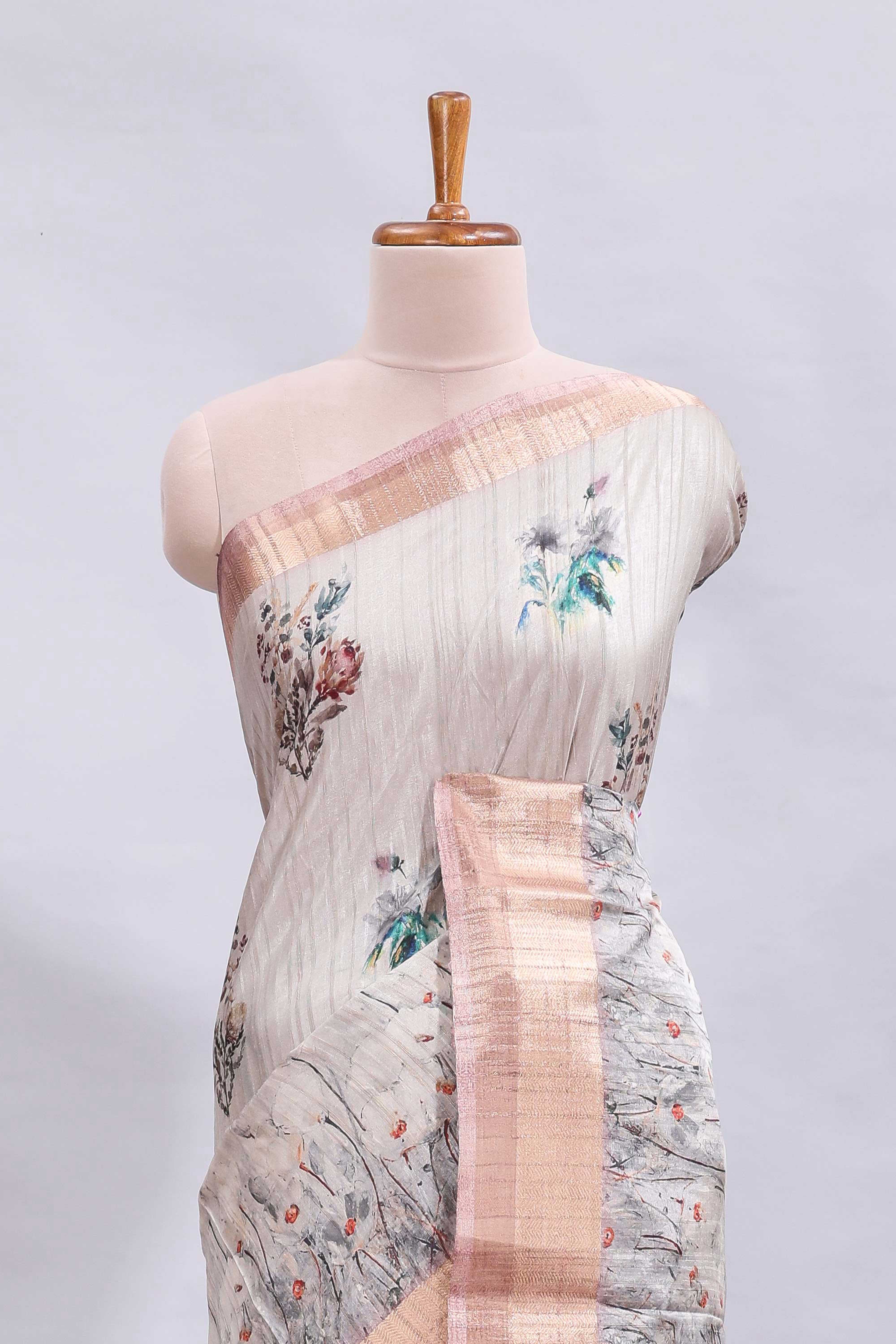 Grey floral design motifs printed saree with contrast zari border and matching blouse