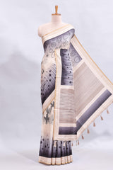 Grey abstract geometric motifs printed saree with contrast border and printed blouse