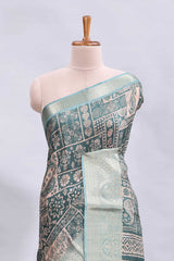Beige floral design printed saree with contrast zari border and matching motifs blouse