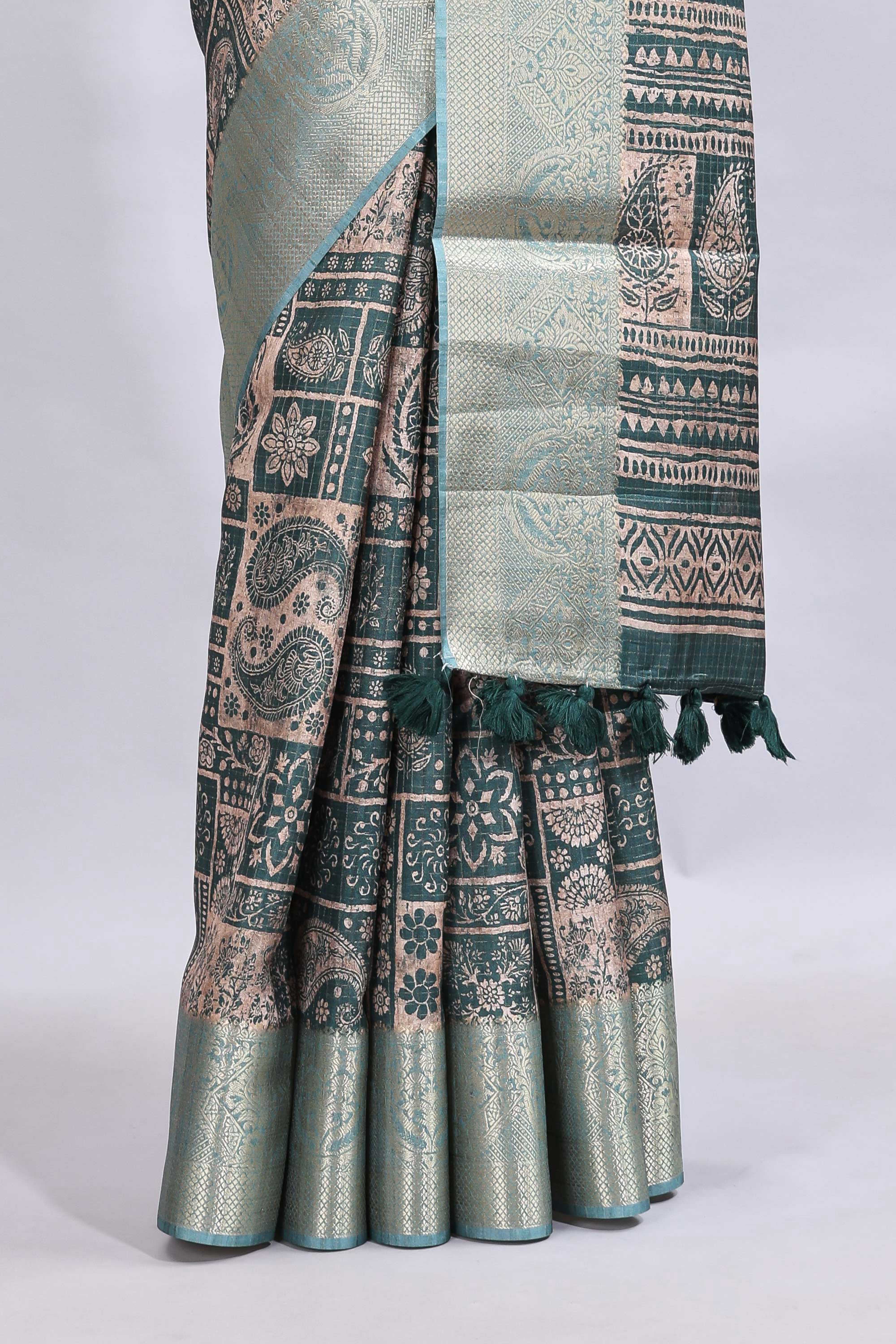Beige floral design printed saree with contrast zari border and matching motifs blouse
