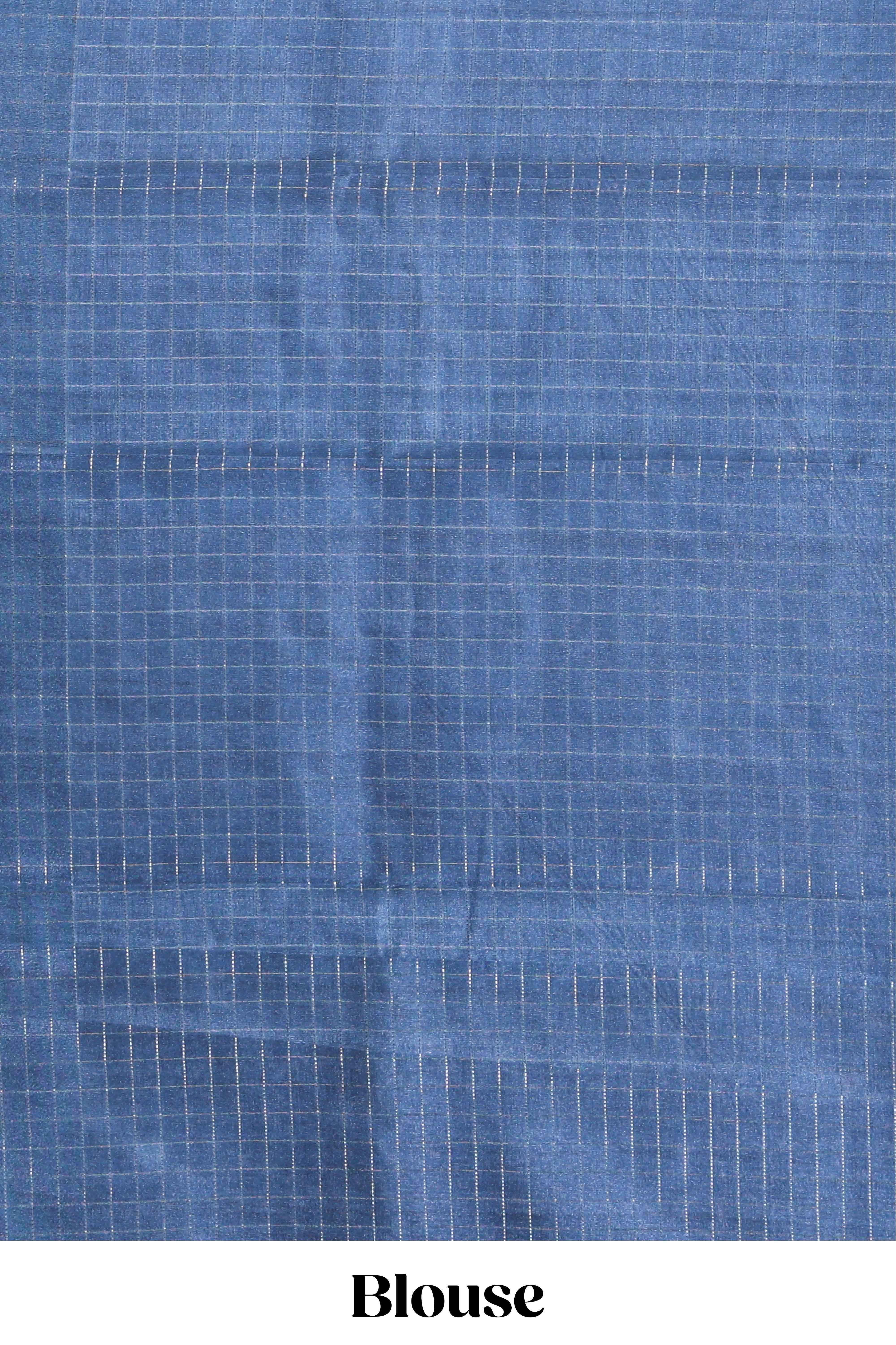 Cream abstract printed saree with contrast checked border and blouse
