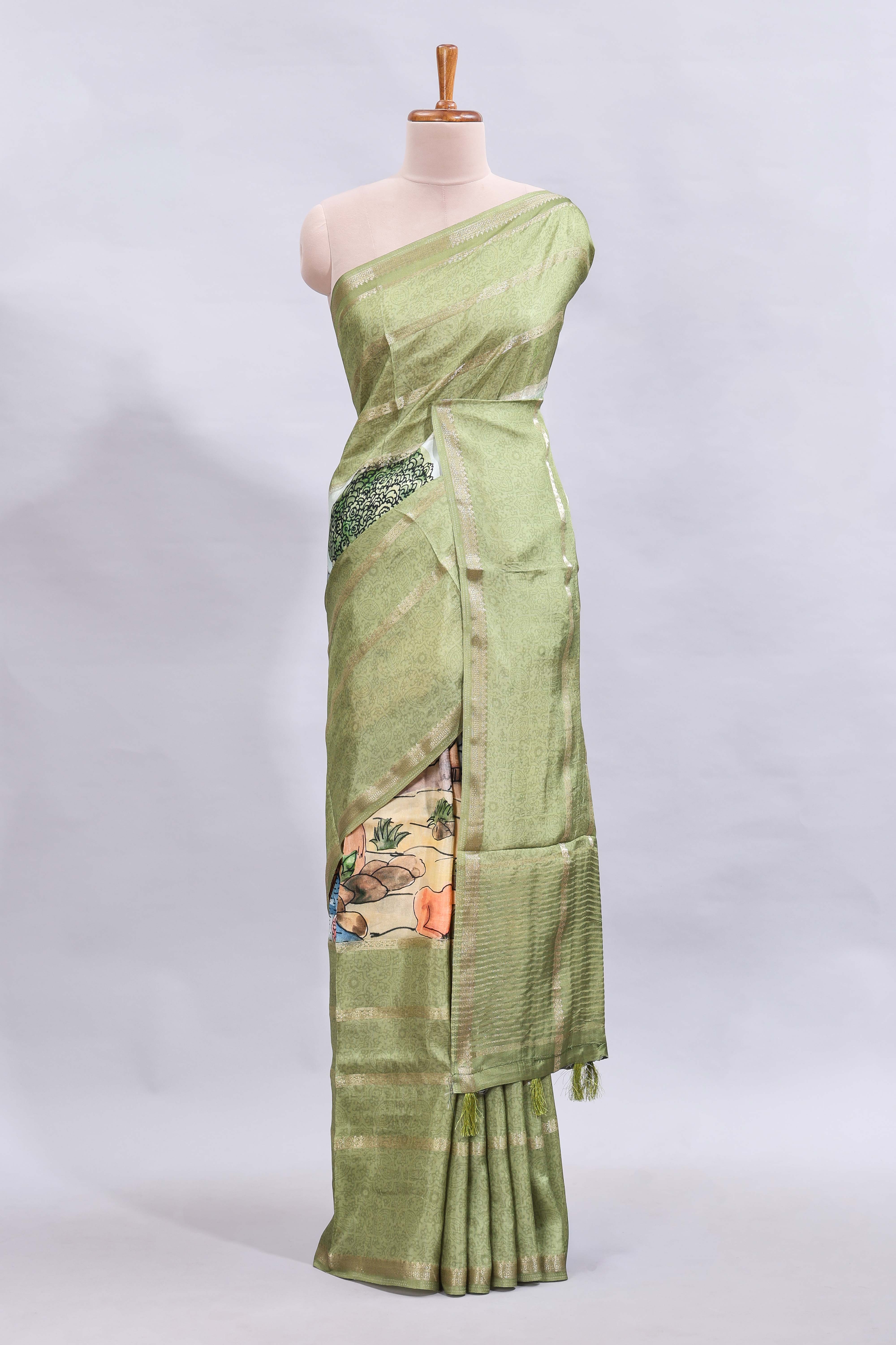 Multi color kalamkari style printed saree with traditional art design with contrast zari border and motifs blouse