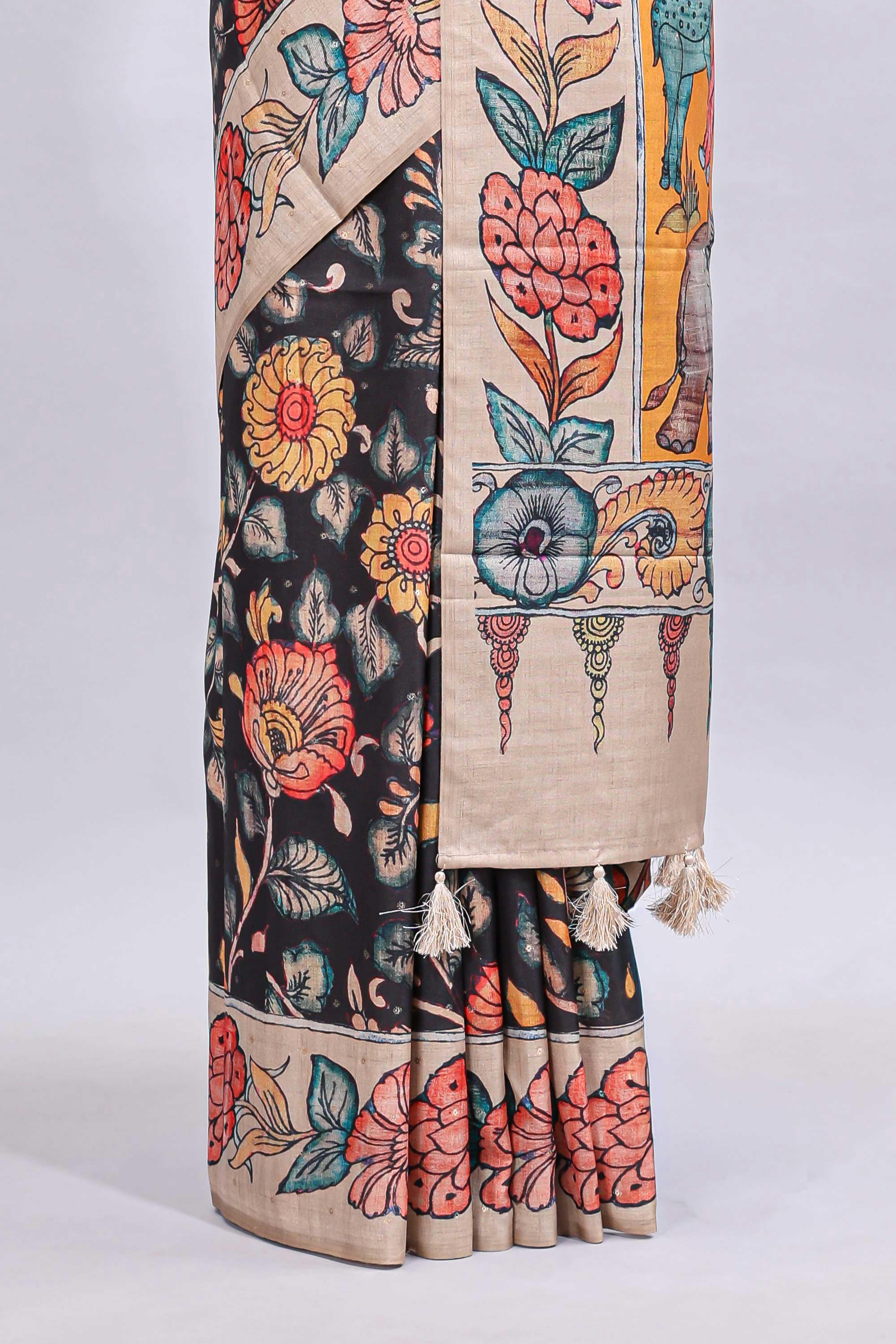 Black kalamkari style floral design printed saree with contrast border and blouse