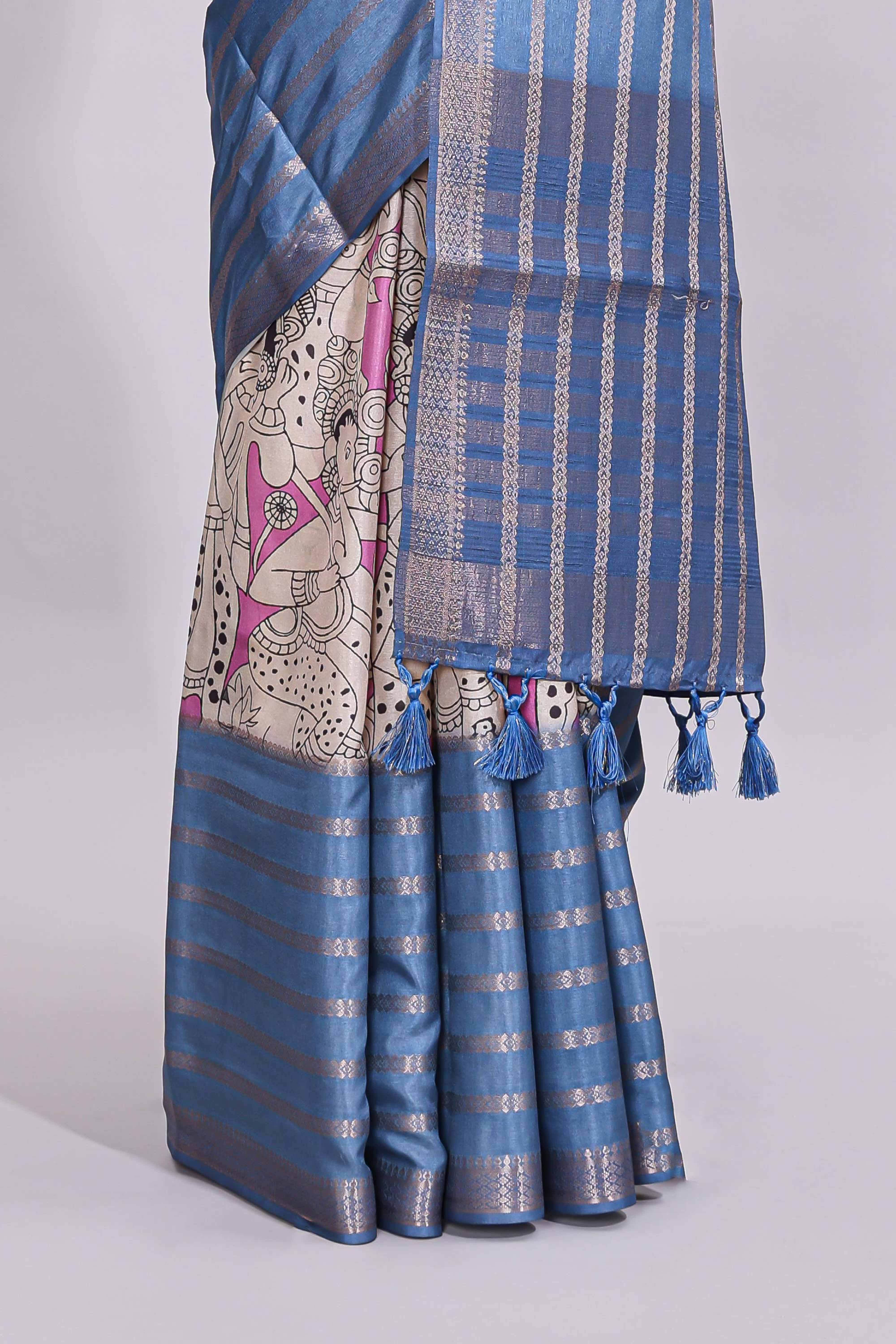 Beige trational kalamkari style printed saree with contrast border and printed blouse