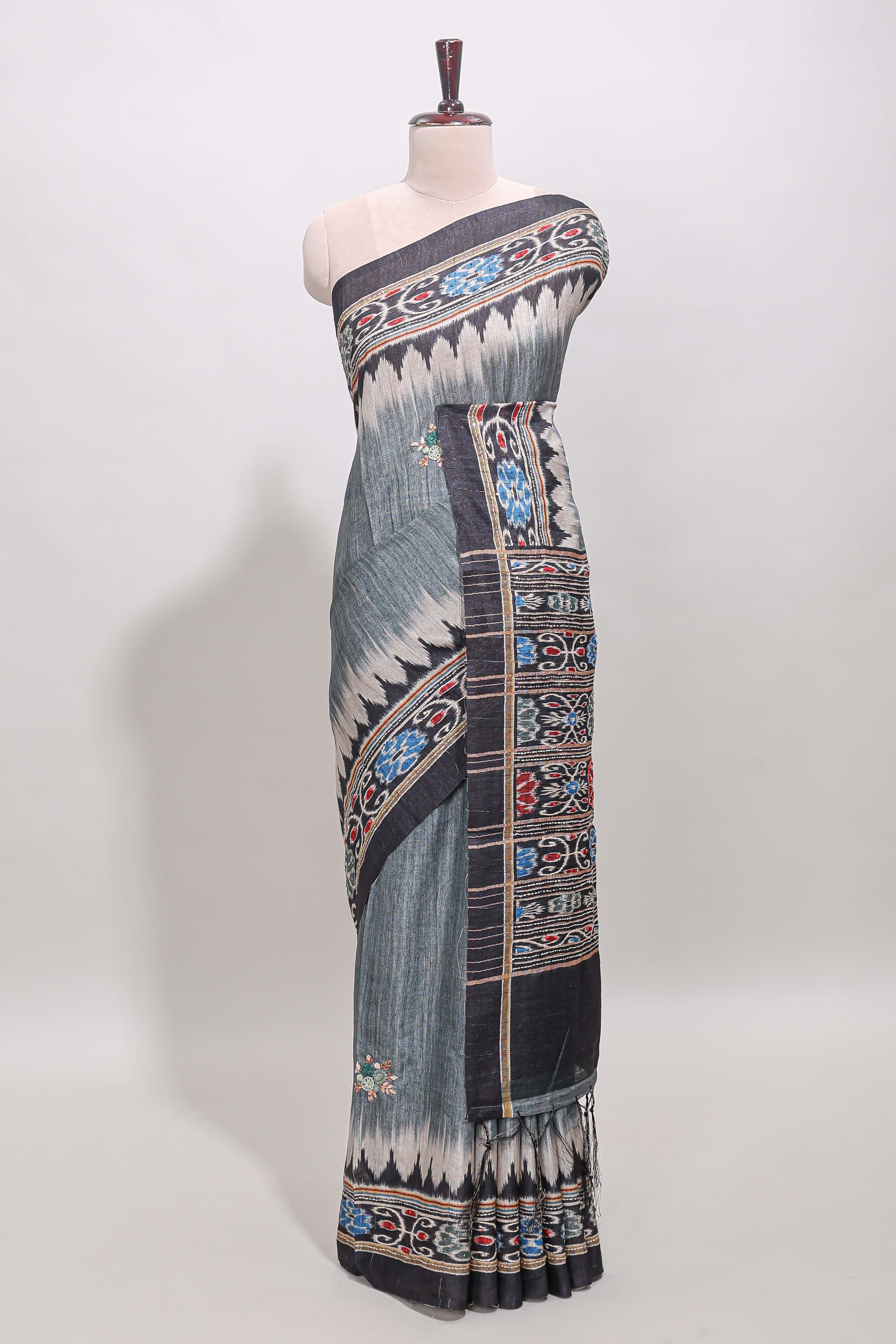 Grey ikkat style floral motifs tussar saree with contrast border and crane bird motif blouse