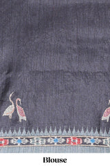 Grey ikkat style floral motifs tussar saree with contrast border and crane bird motif blouse