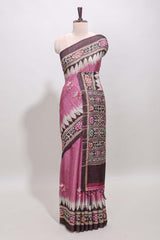 Pink ikkat style floral motifs tussar saree with contrast border and crane bird motif blouse