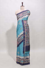 Blue ikkat style floral motifs tussar saree with contrast border and crane bird motif blouse