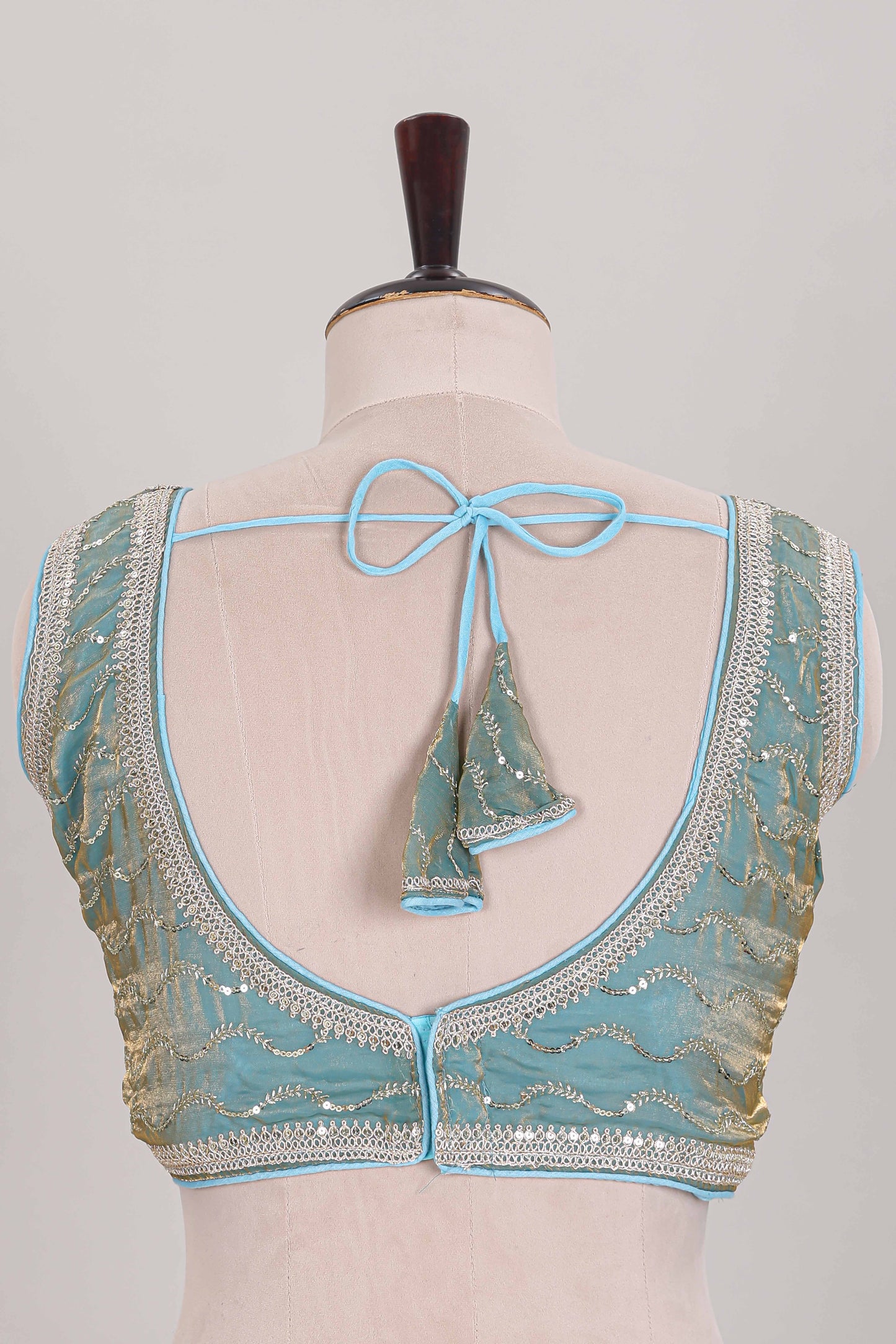 Sky blue embroidery work readymade designer blouse, sleeveless sweatheart neck with back tassels