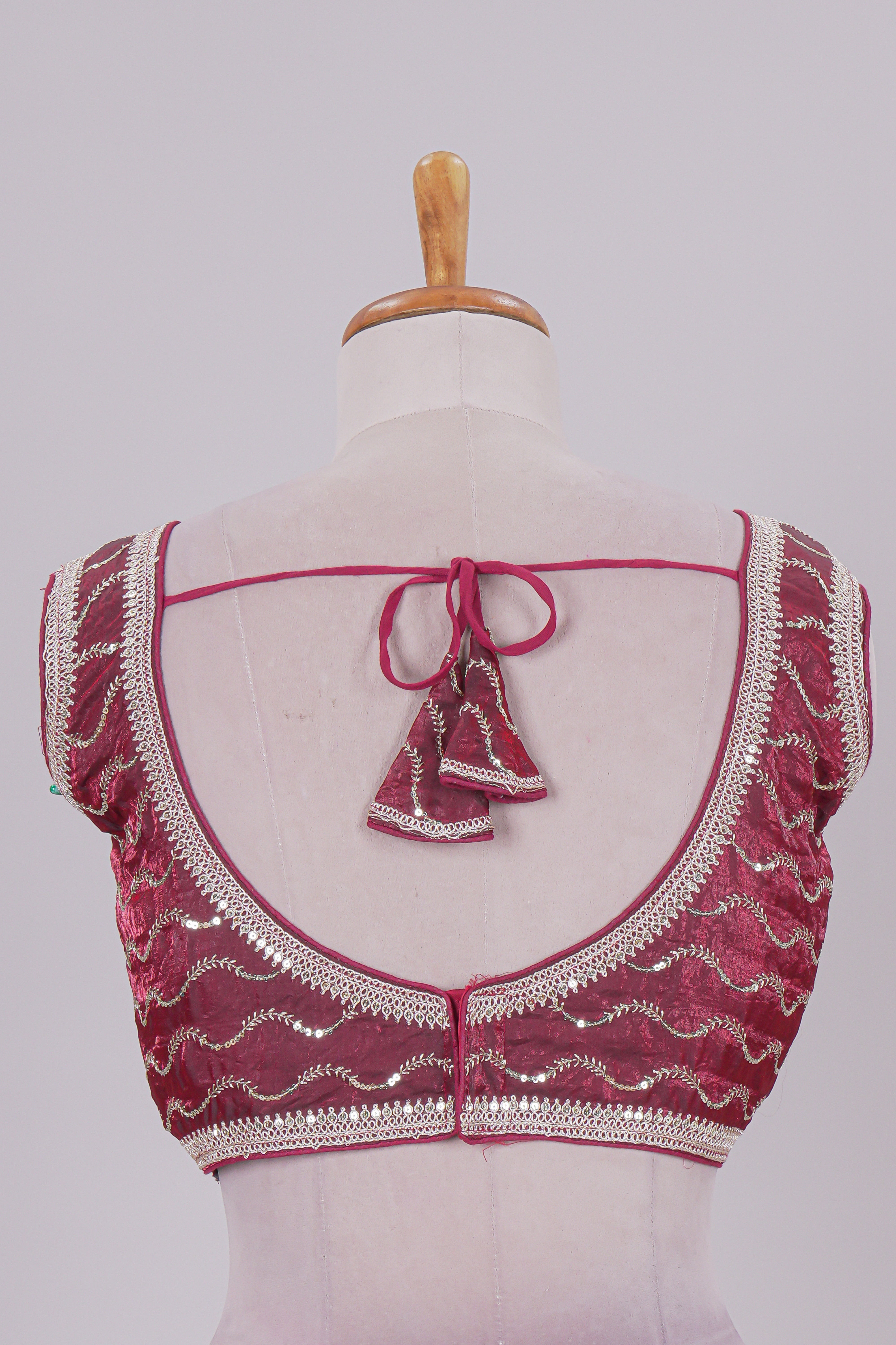 Maroon chamki embroidery work readymade designer blouse, sleeveless V neck with back tassels