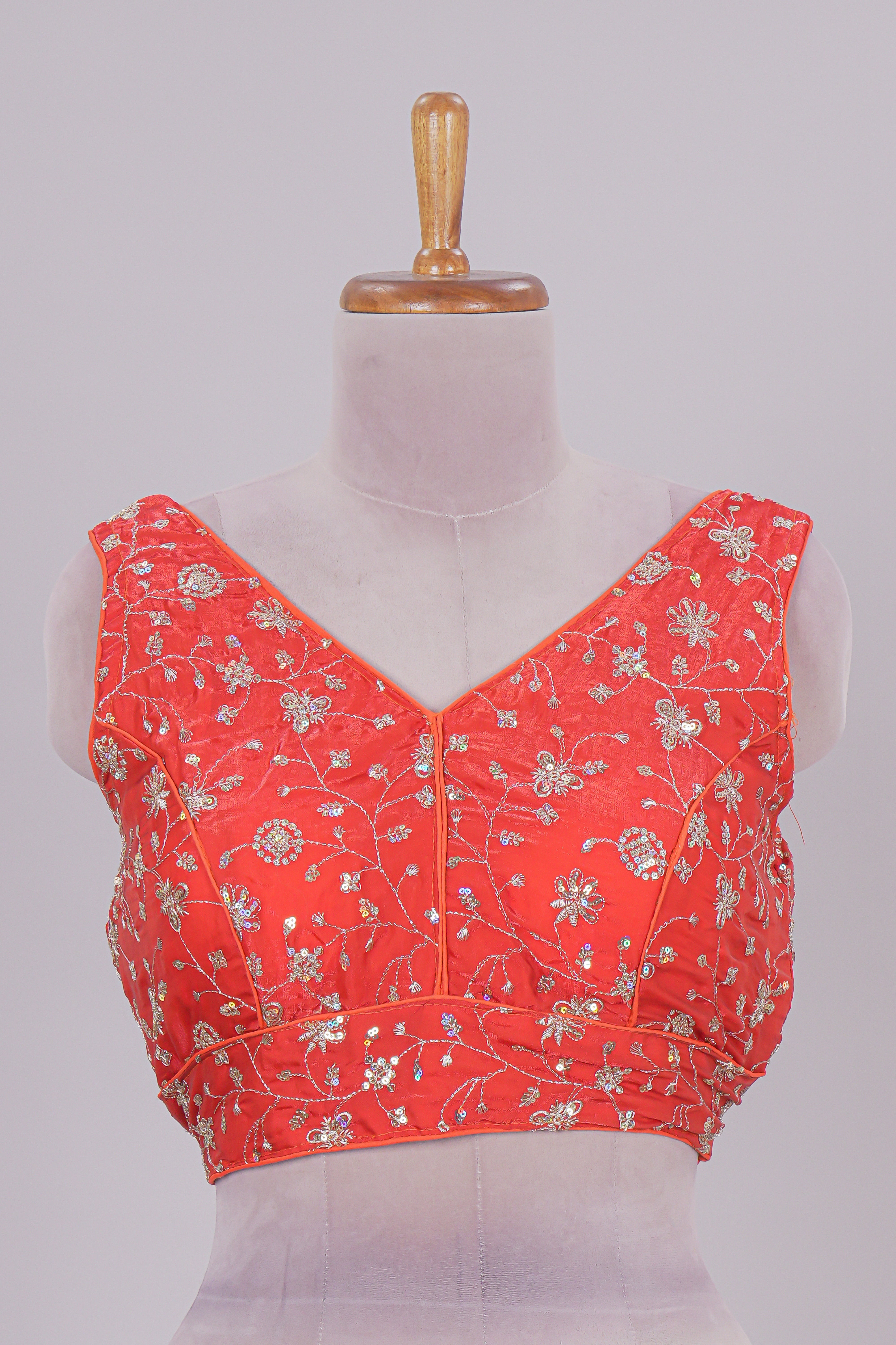 Orange floral chamki embroidery work readymade designer blouse, sleeveless V neck with back tassels