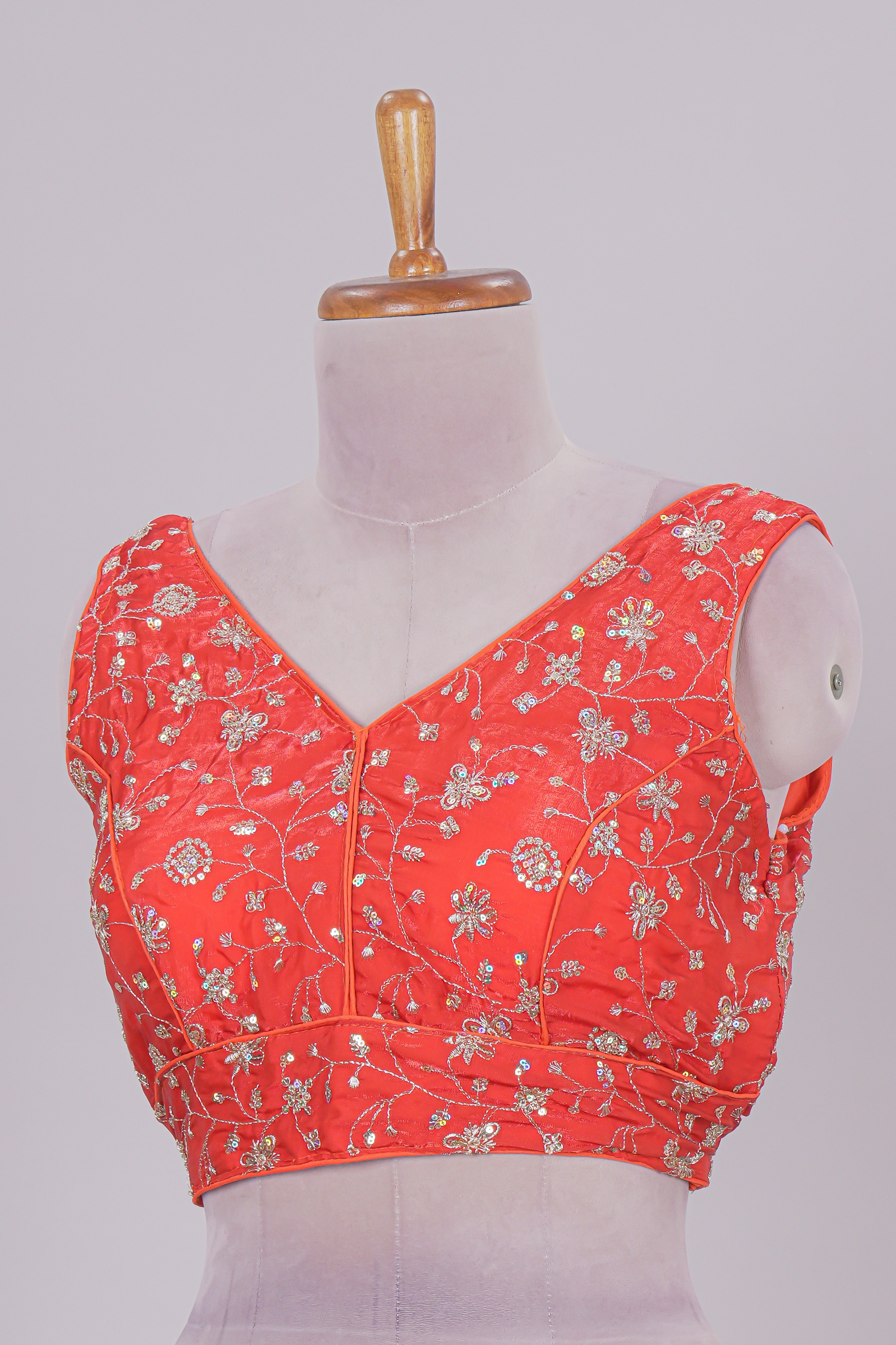 Orange floral chamki embroidery work readymade designer blouse, sleeveless V neck with back tassels