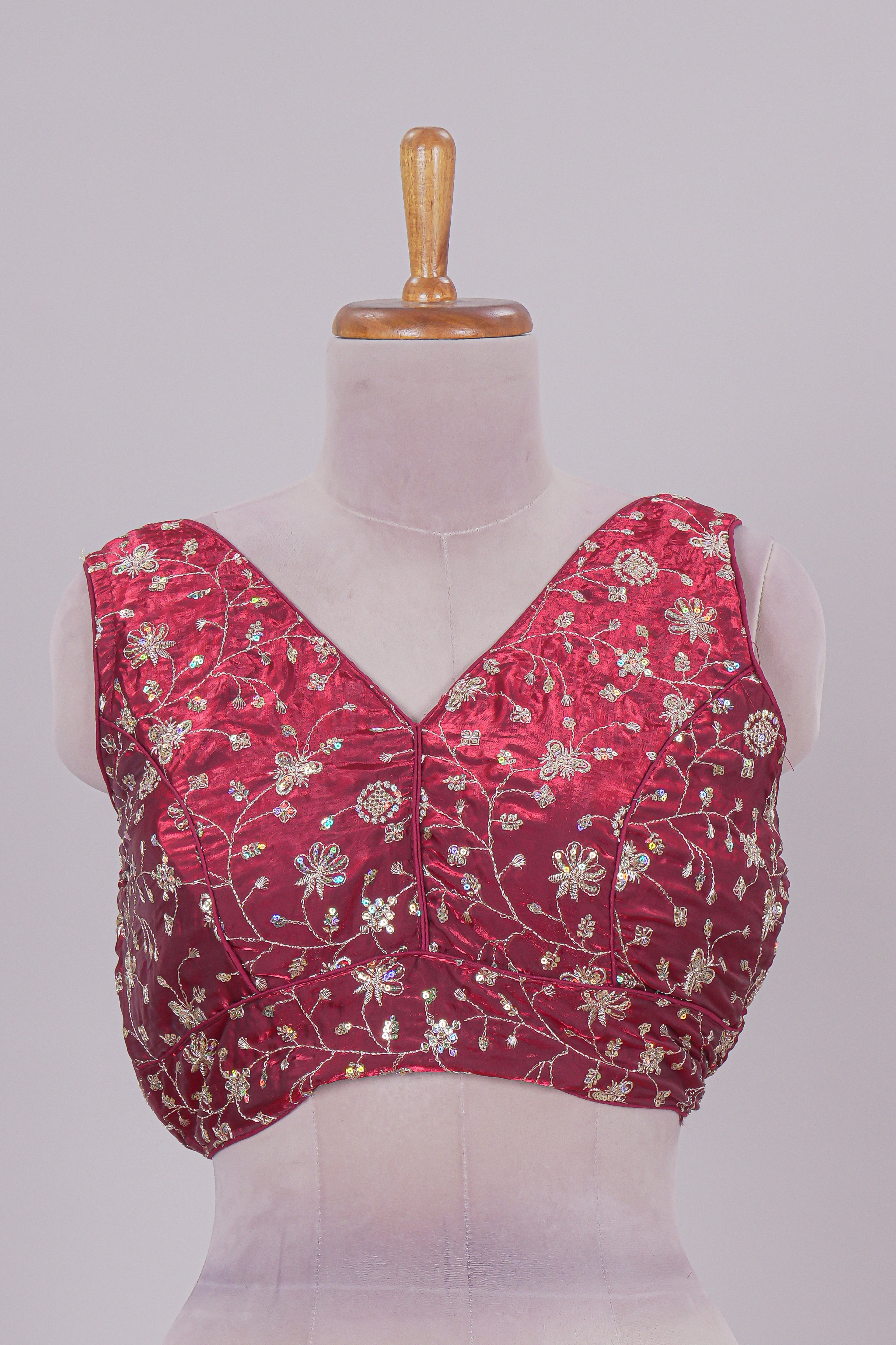 Maroon floral chamki embroidery work readymade designer blouse, sleeveless V neck with back tassels