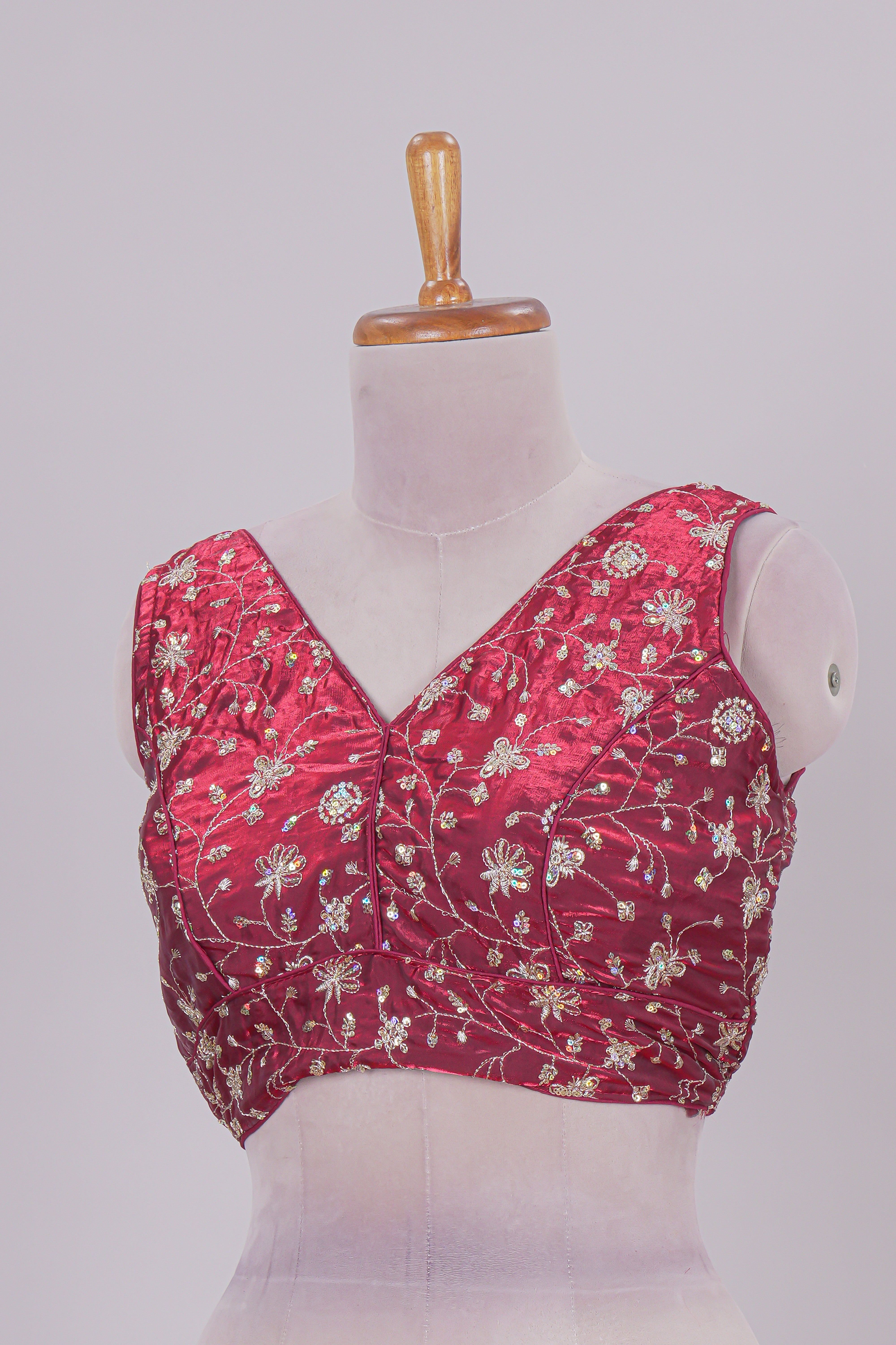 Maroon floral chamki embroidery work readymade designer blouse, sleeveless V neck with back tassels