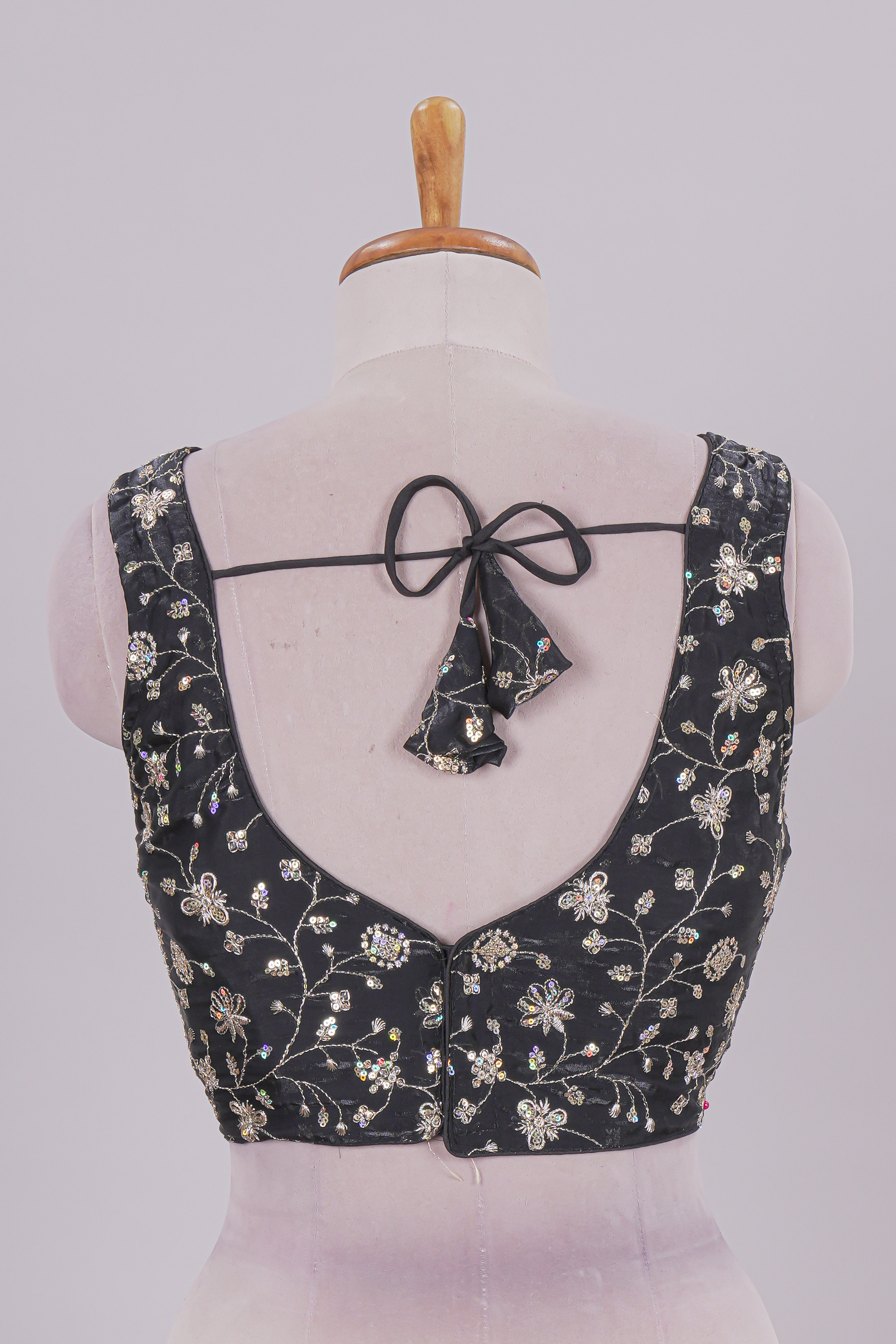 Black floral chamki embroidery work readymade designer blouse, sleeveless V neck with back tassels