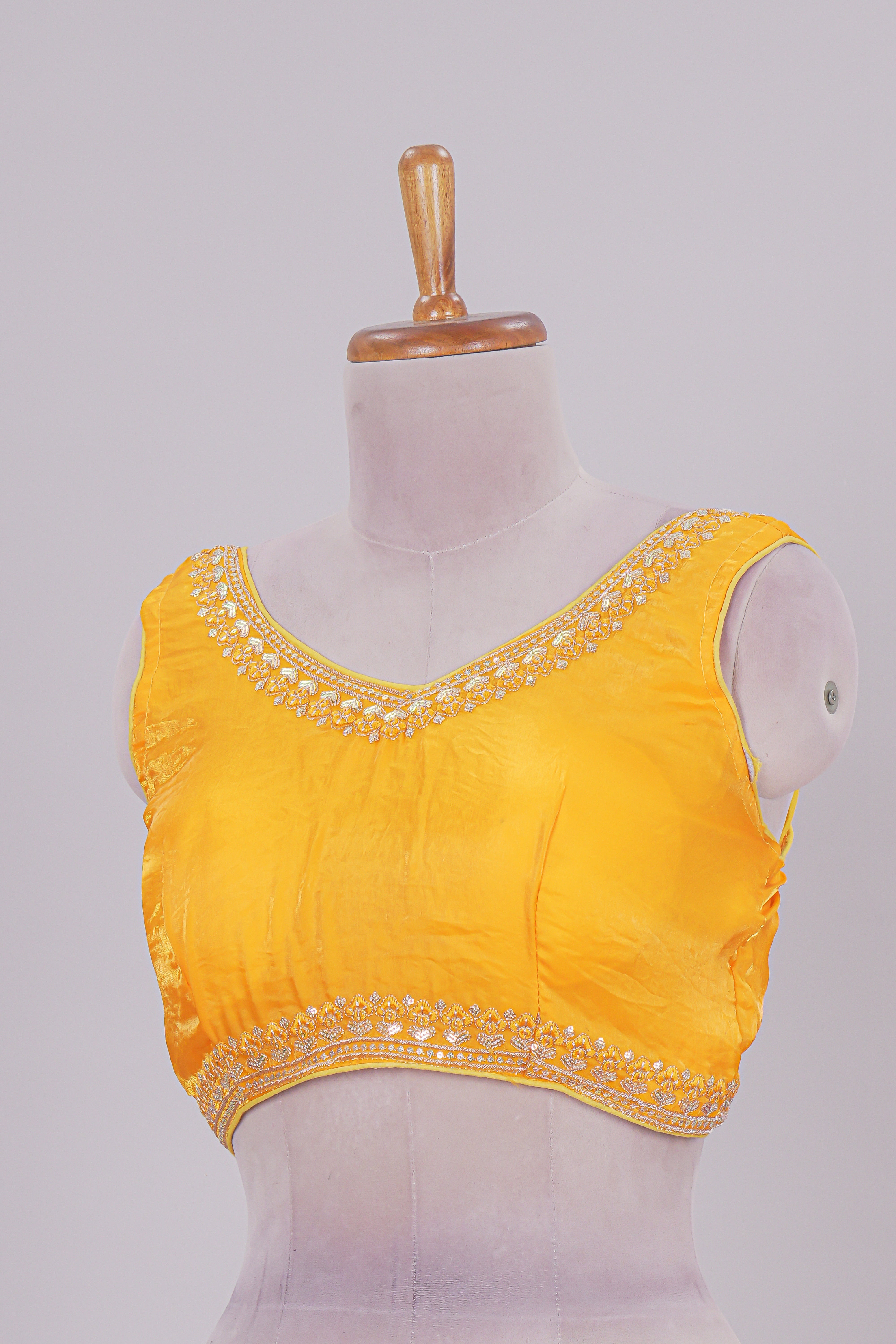 Golden yellow chamki embroidery work readymade designer blouse, sleeveless V neck with back tassels
