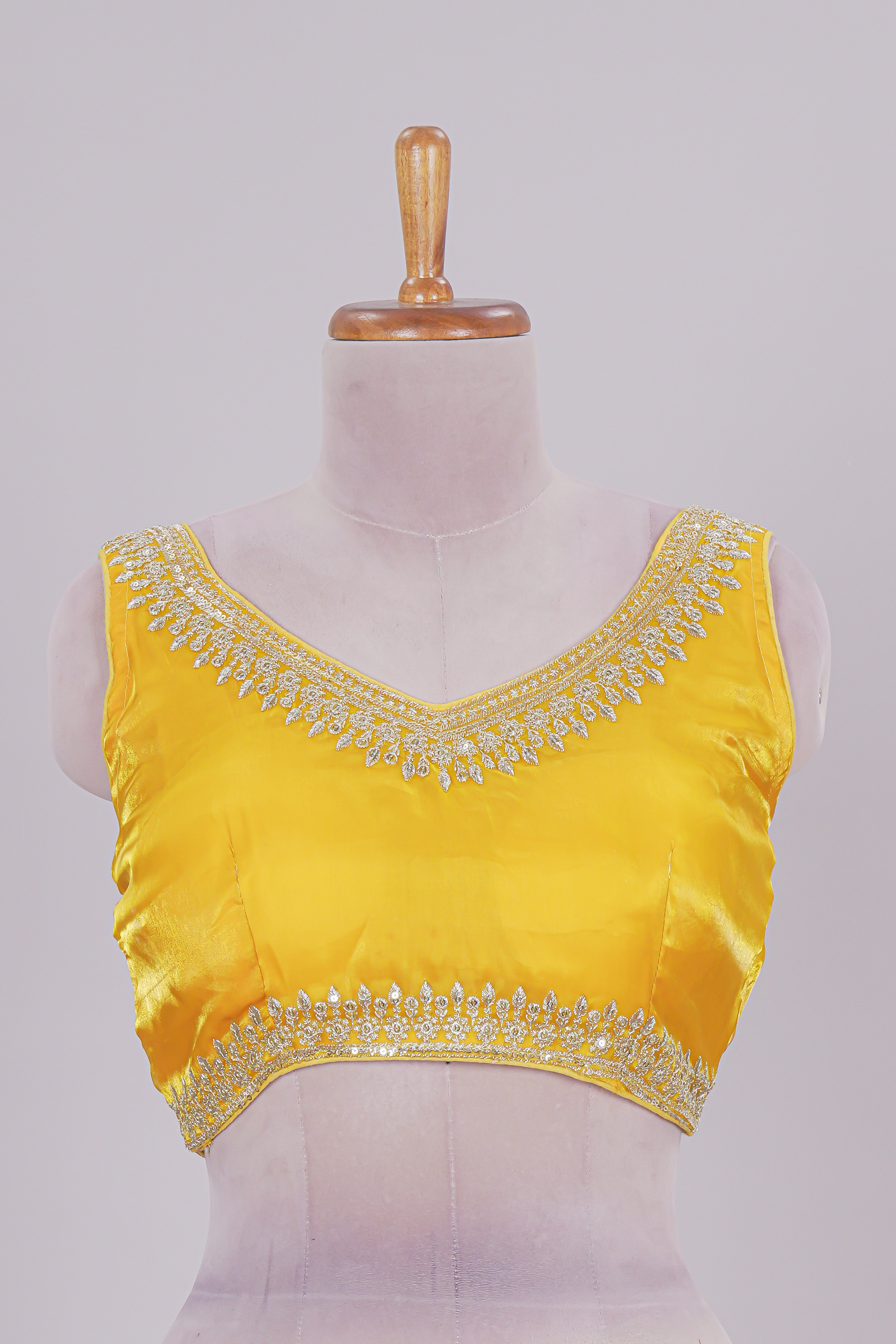 Yellow chamki embroidery work readymade designer blouse, sleeveless V neck with back tassels