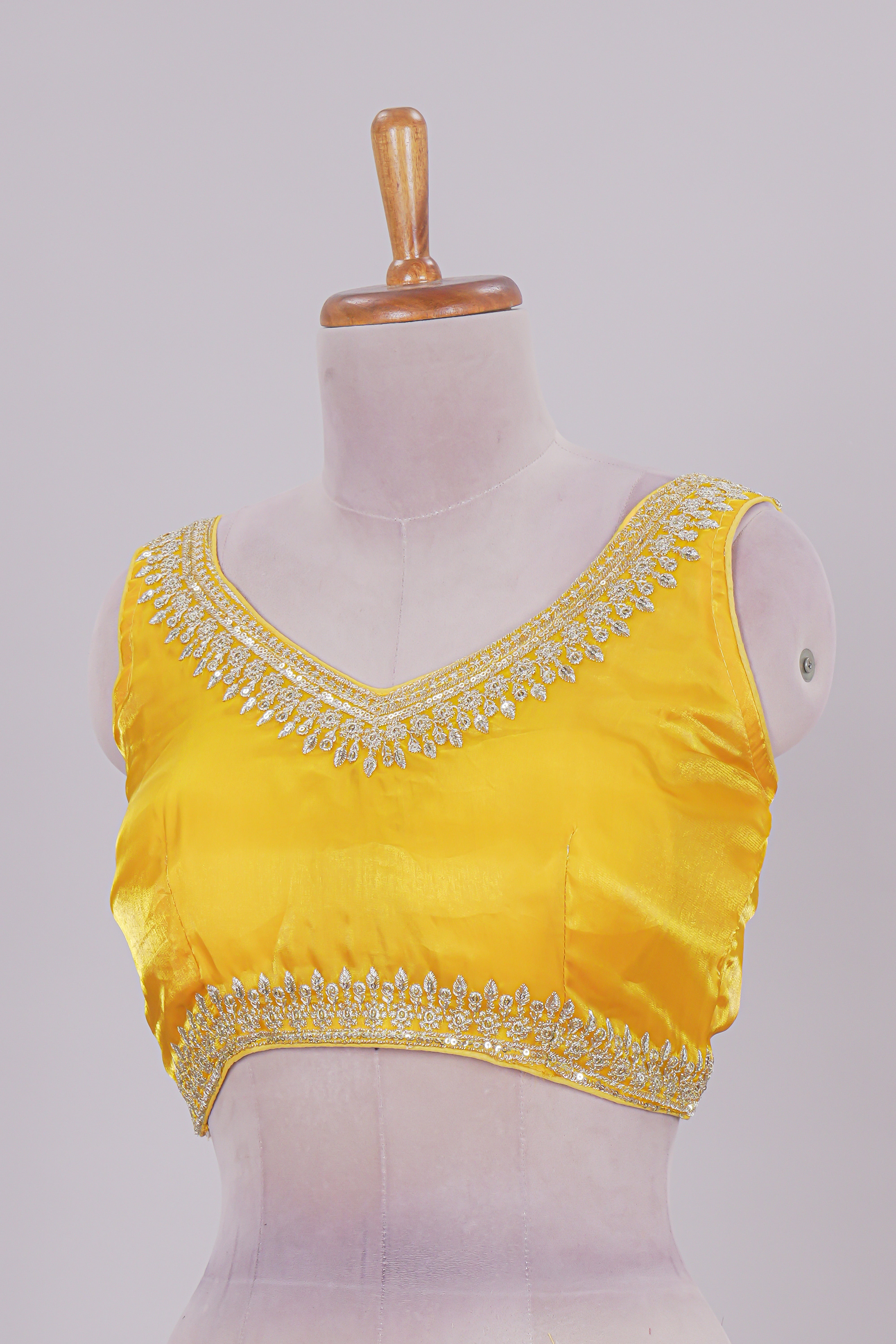 Yellow chamki embroidery work readymade designer blouse, sleeveless V neck with back tassels