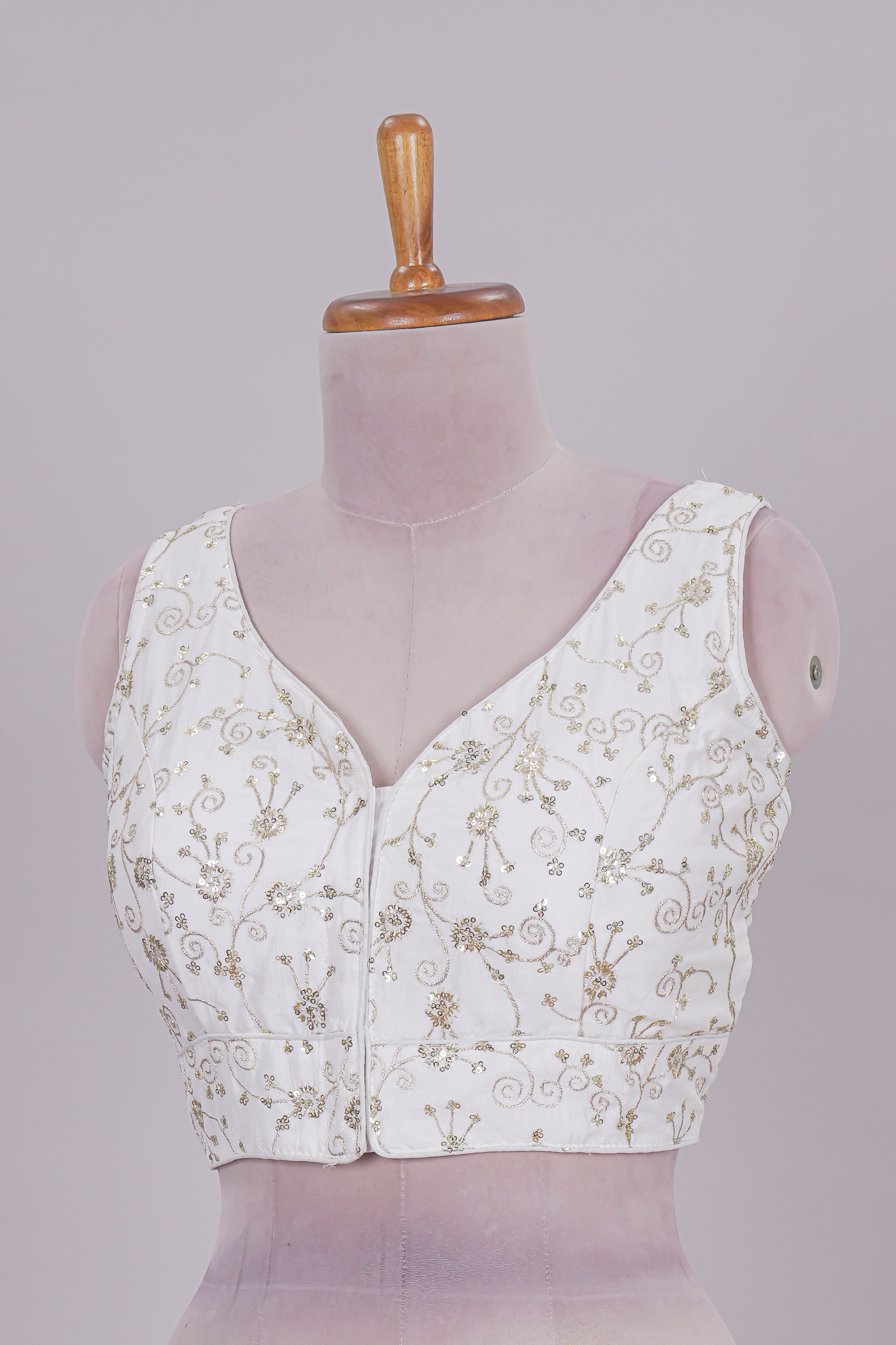 White chamki embroidery work readymade designer blouse, sleeveless V neck with back tassels