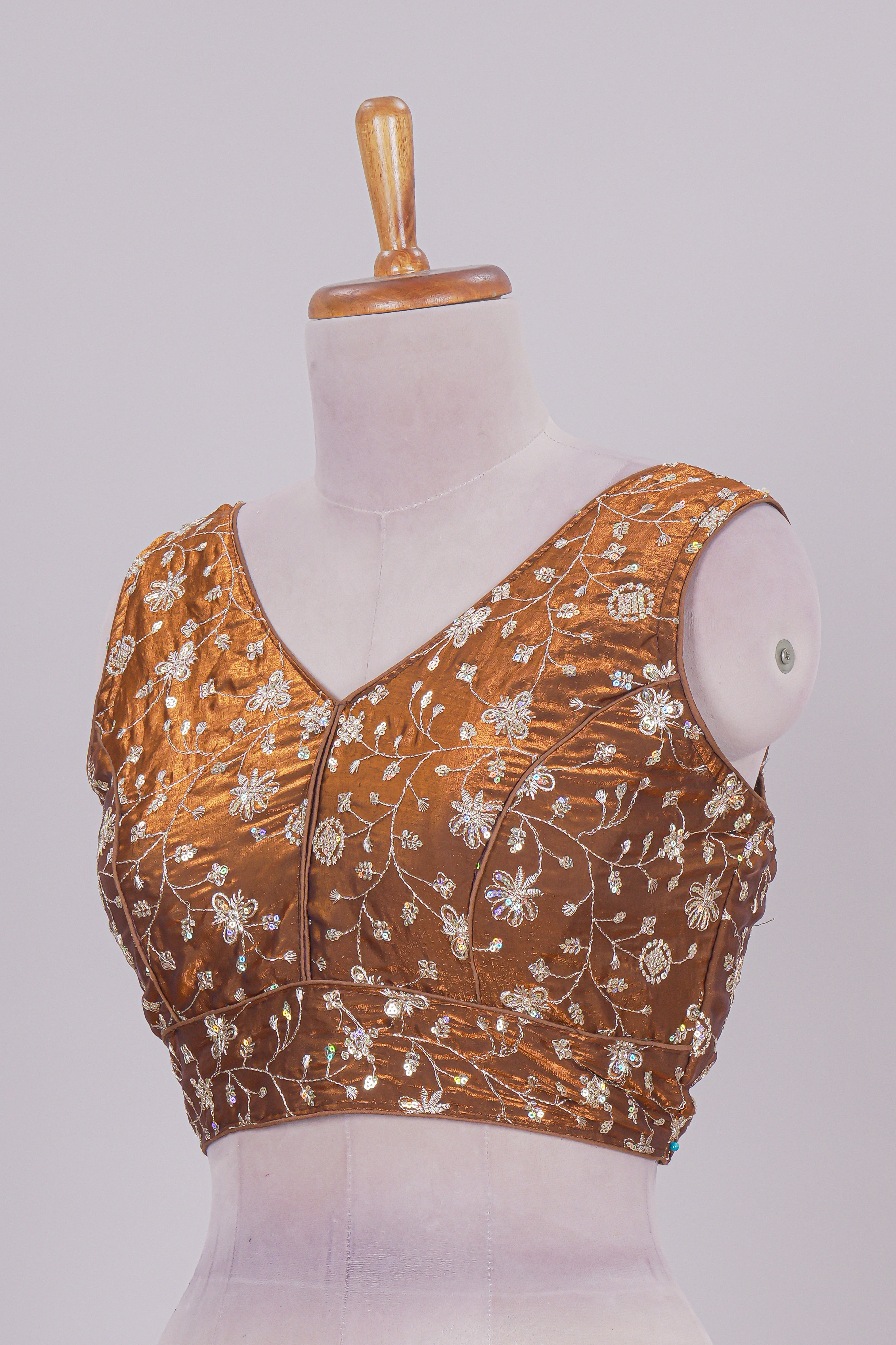 Mustard floral chamki embroidery work readymade designer blouse, sleeveless V neck with back tassels