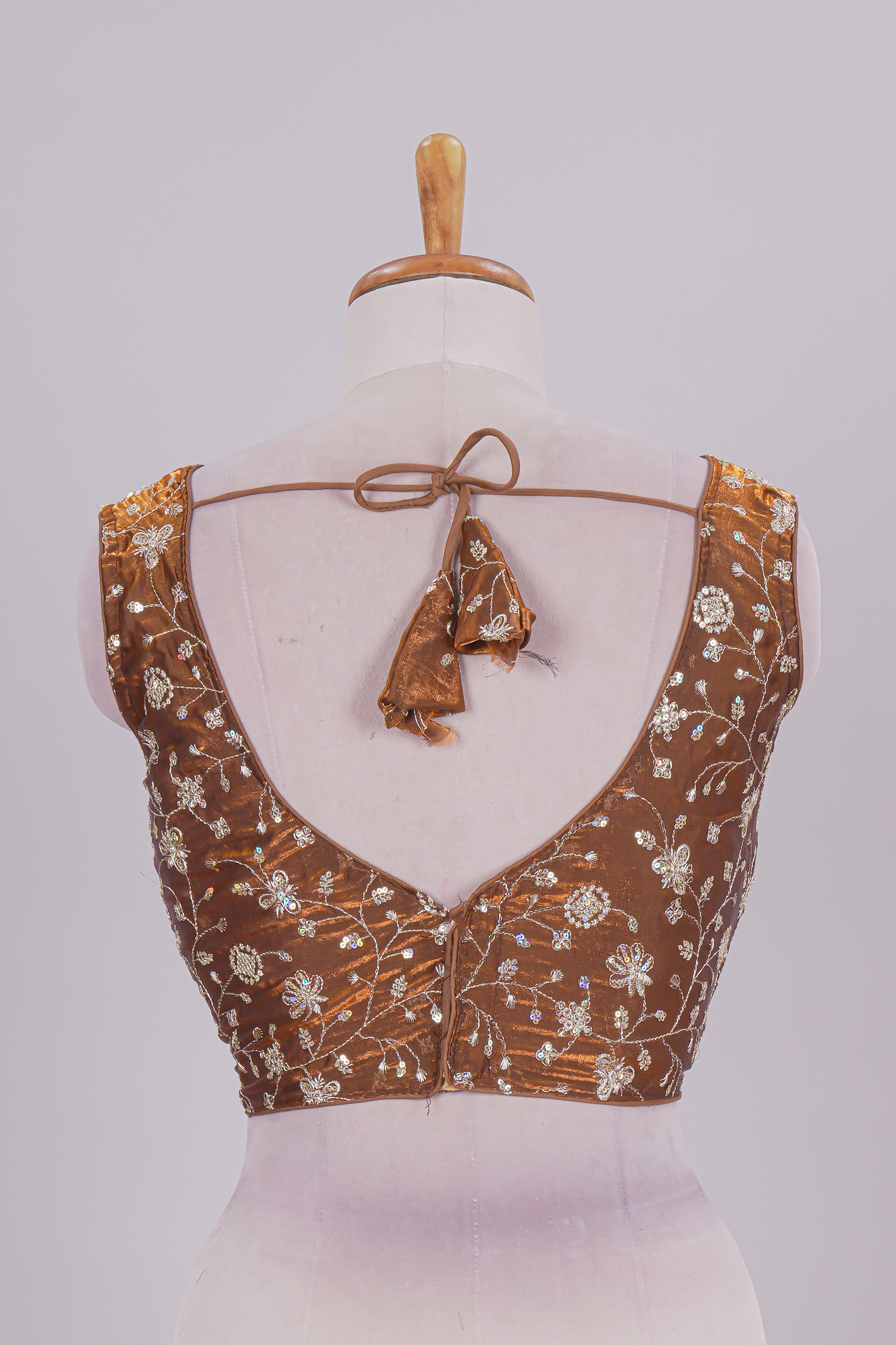 Mustard floral chamki embroidery work readymade designer blouse, sleeveless V neck with back tassels