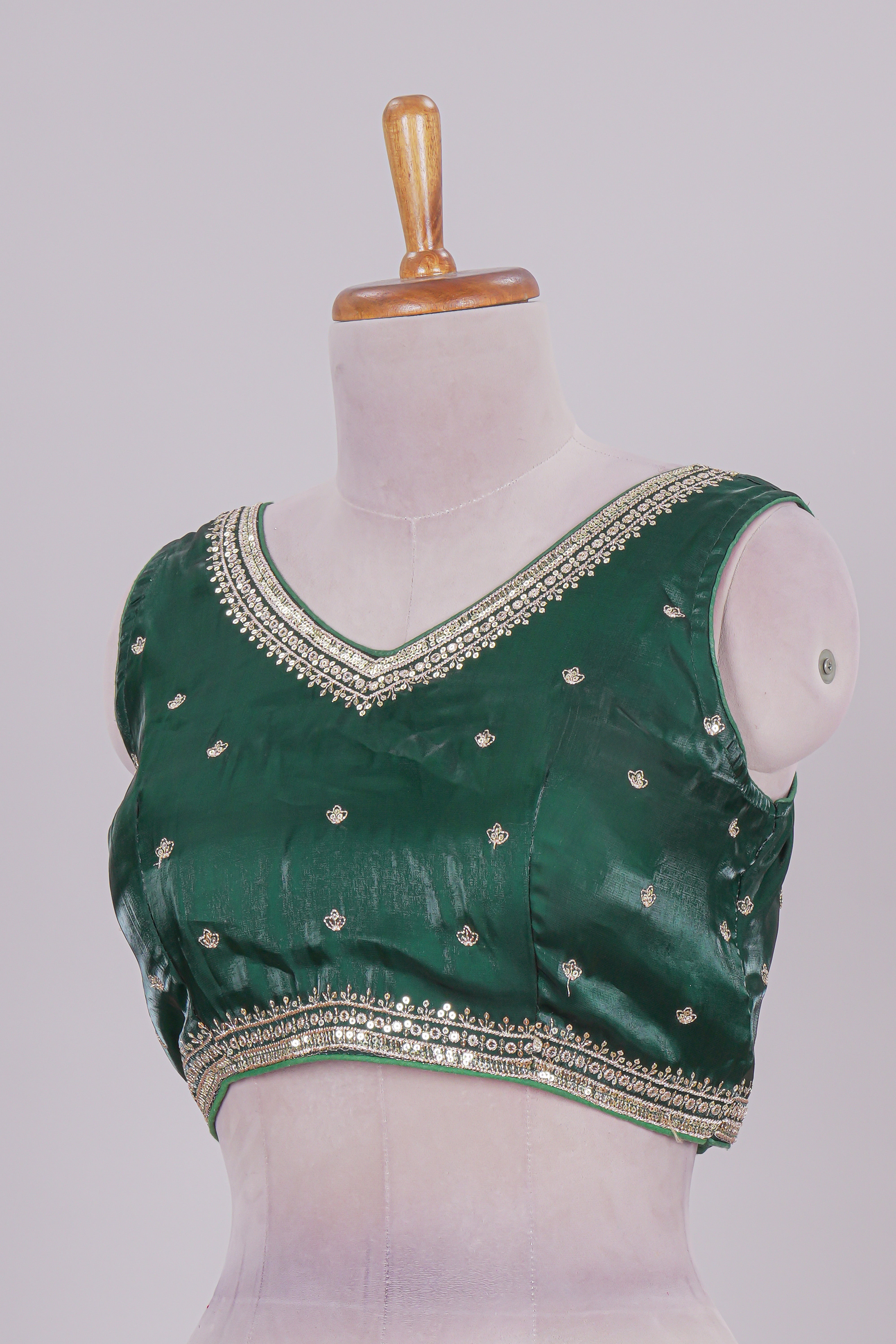 Green floral chamki embroidery work readymade designer blouse, sleeveless V neck with back tassels