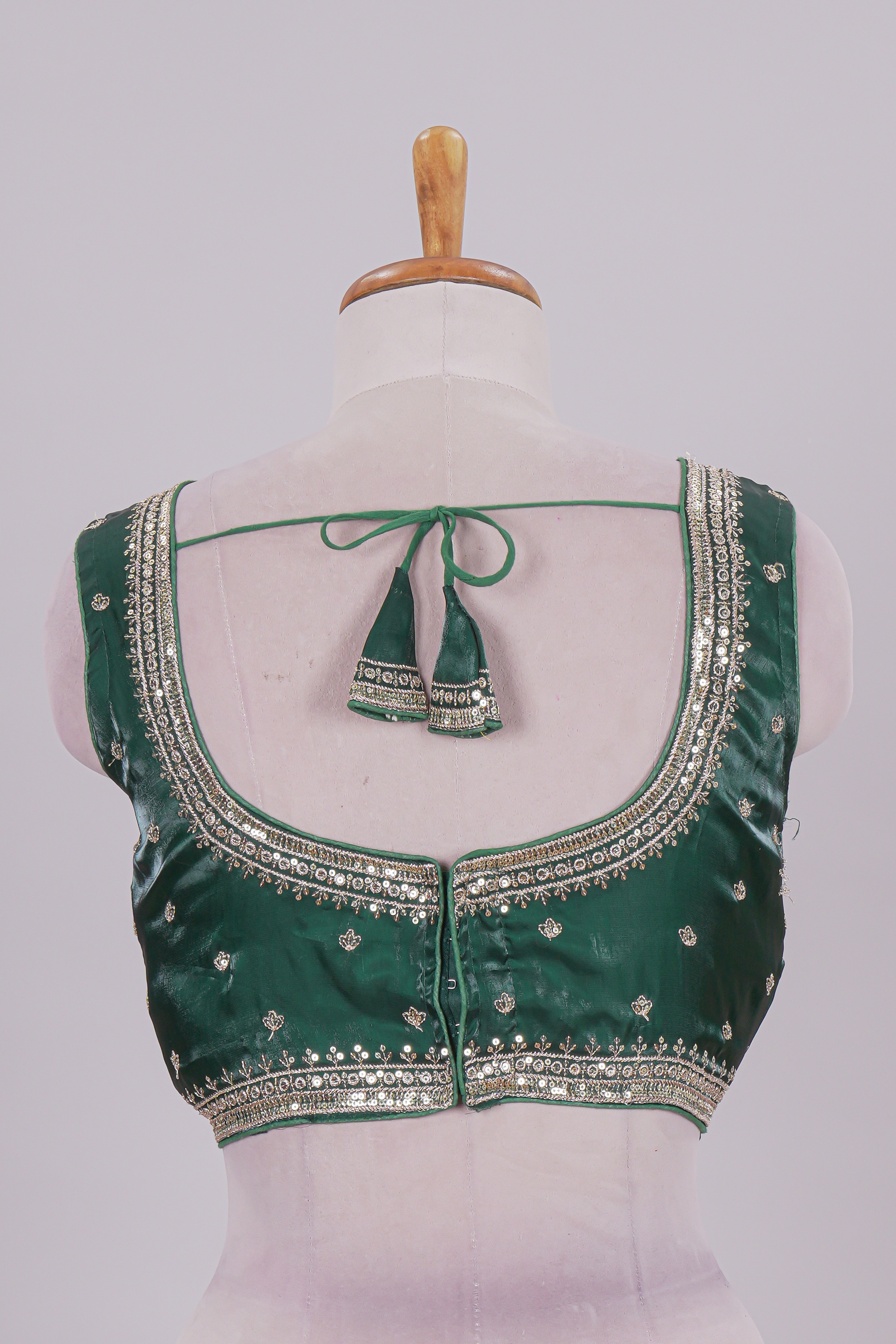 Green floral chamki embroidery work readymade designer blouse, sleeveless V neck with back tassels