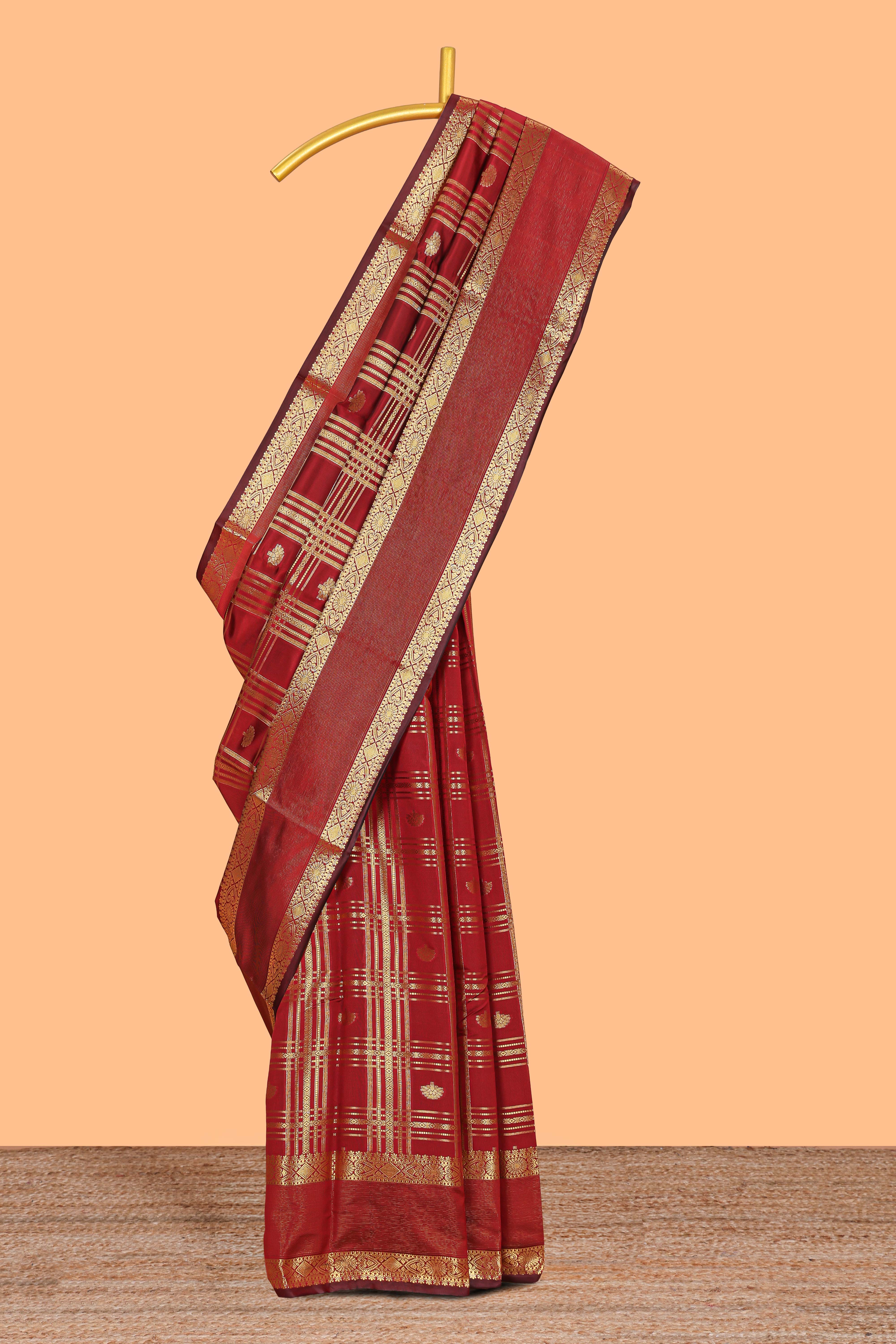 Red zari checks and buttas raw silk saree with self zari border and matching blouse
