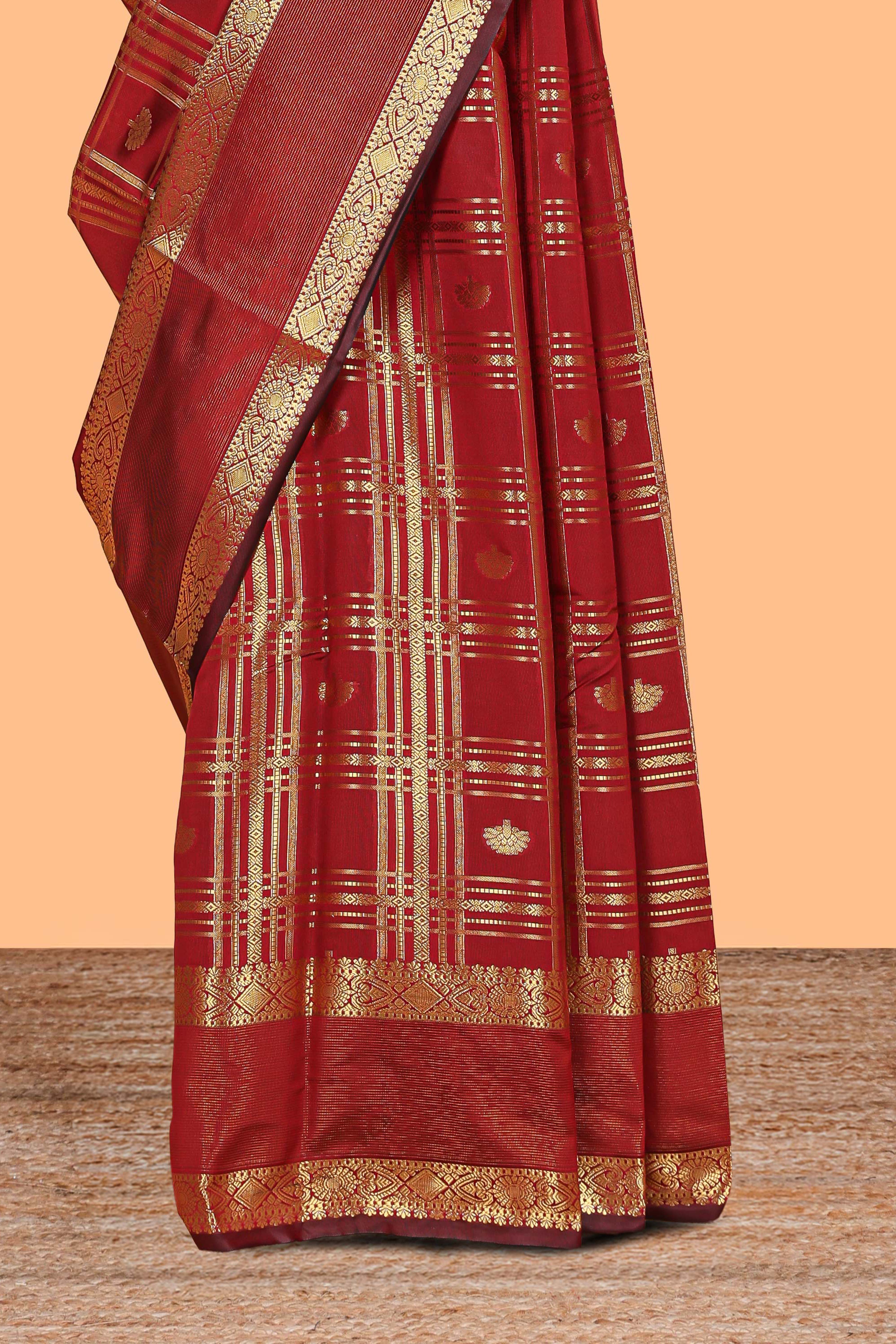 Red zari checks and buttas raw silk saree with self zari border and matching blouse