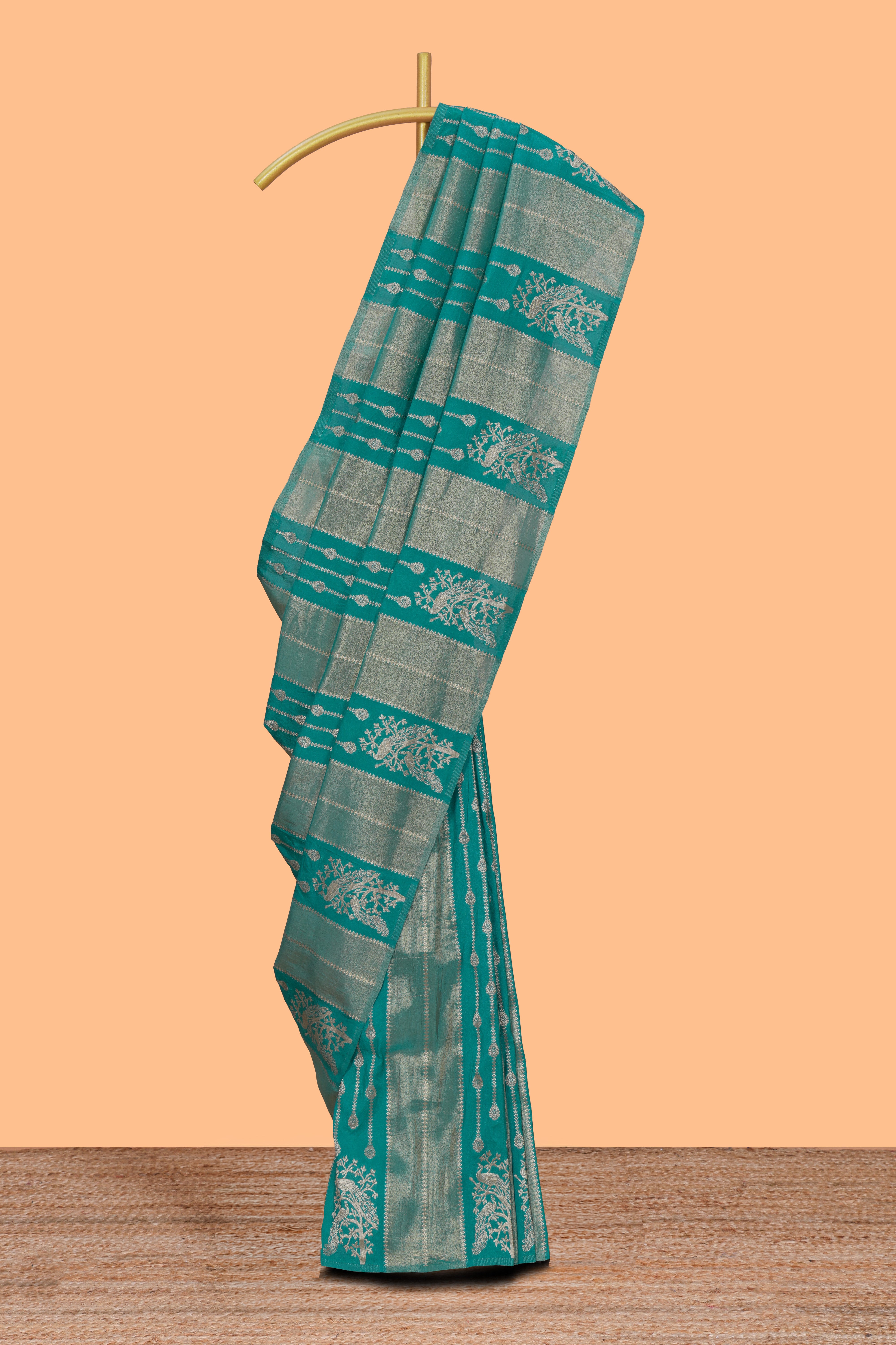 Borderless green striped and peacock zari design raw silk saree with self zari pallu and matching blouse