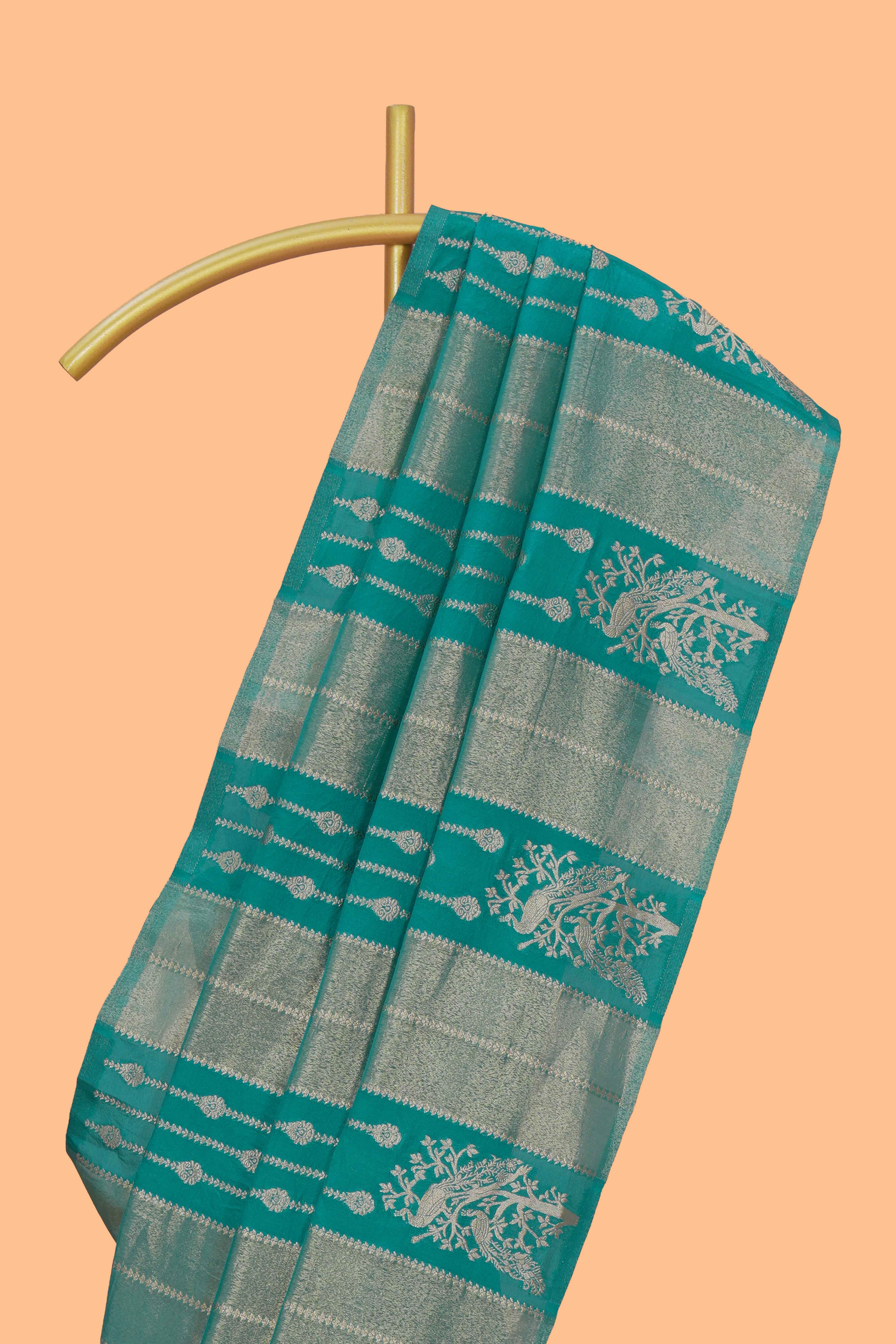 Borderless green striped and peacock zari design raw silk saree with self zari pallu and matching blouse