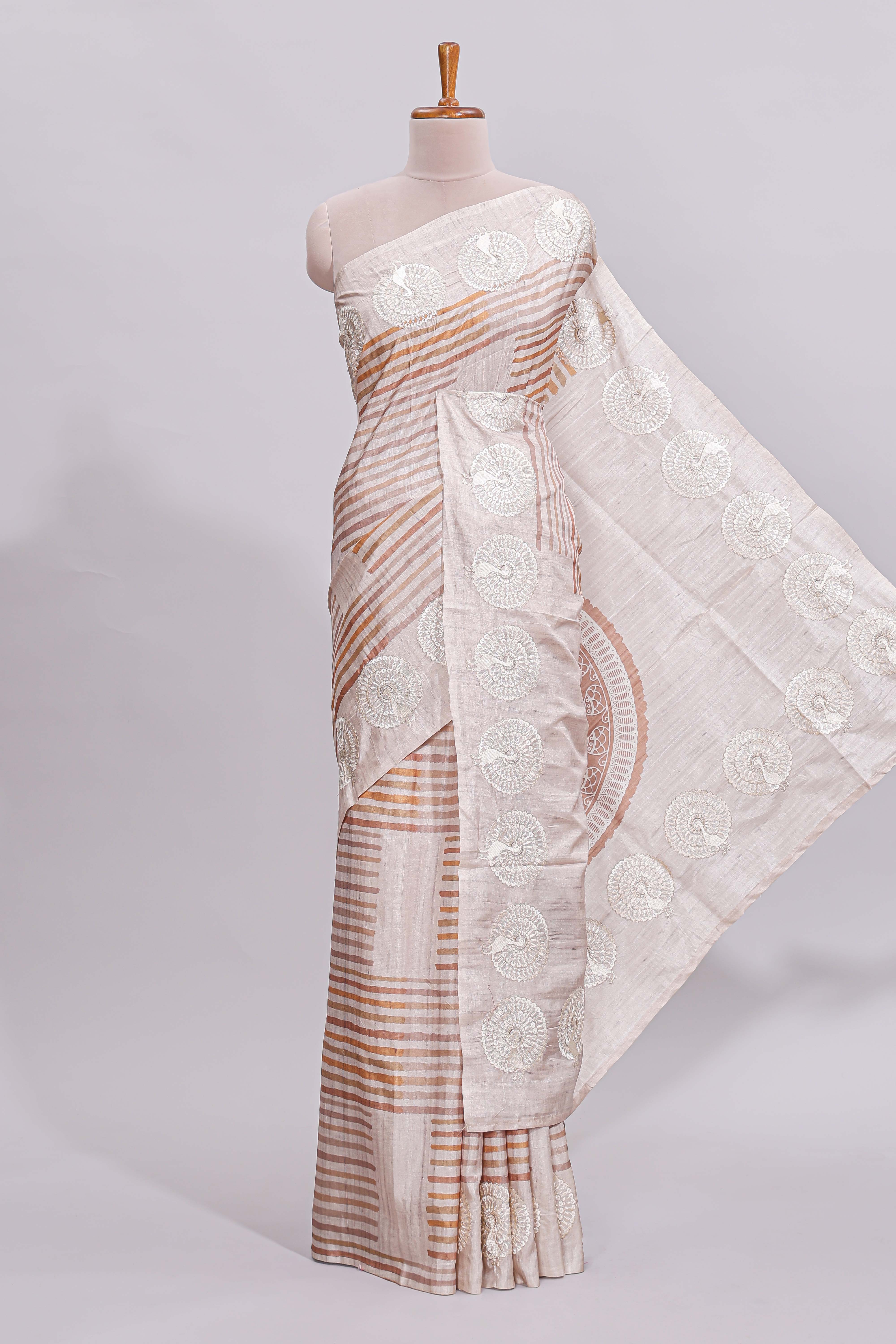 Beige striped design raw silk saree with self border and matching blouse